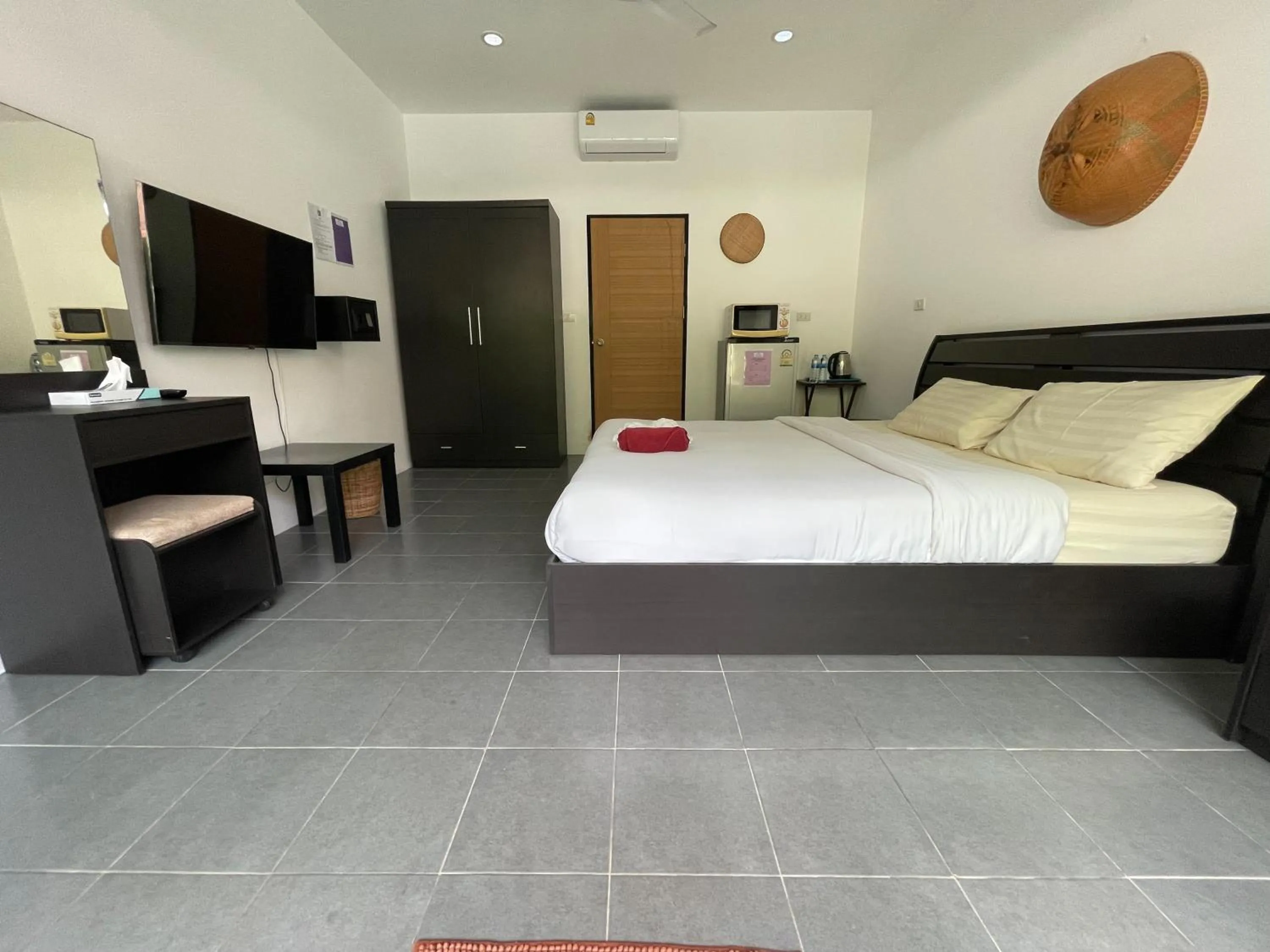 Bed in Lotus Bleu Resort & Restaurant