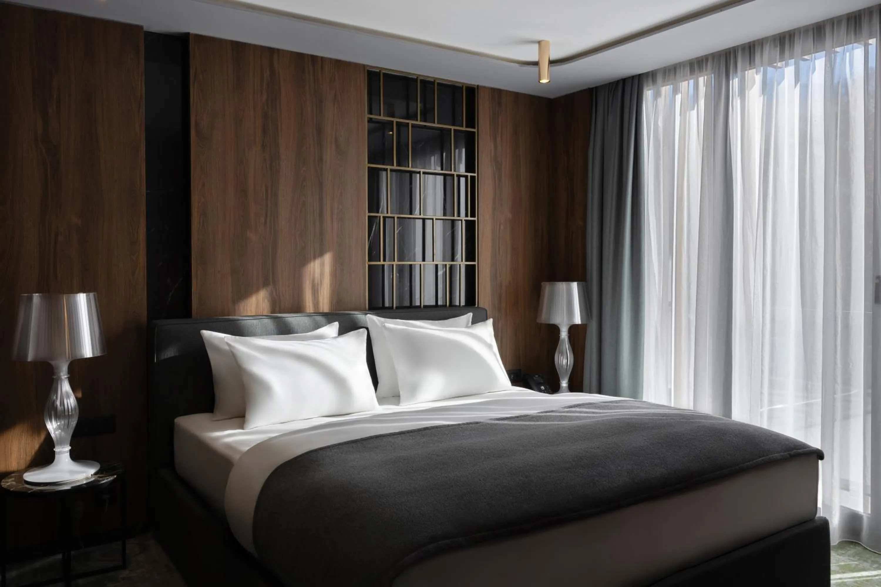 Bed in Apeiro City Avant-garde Hotel