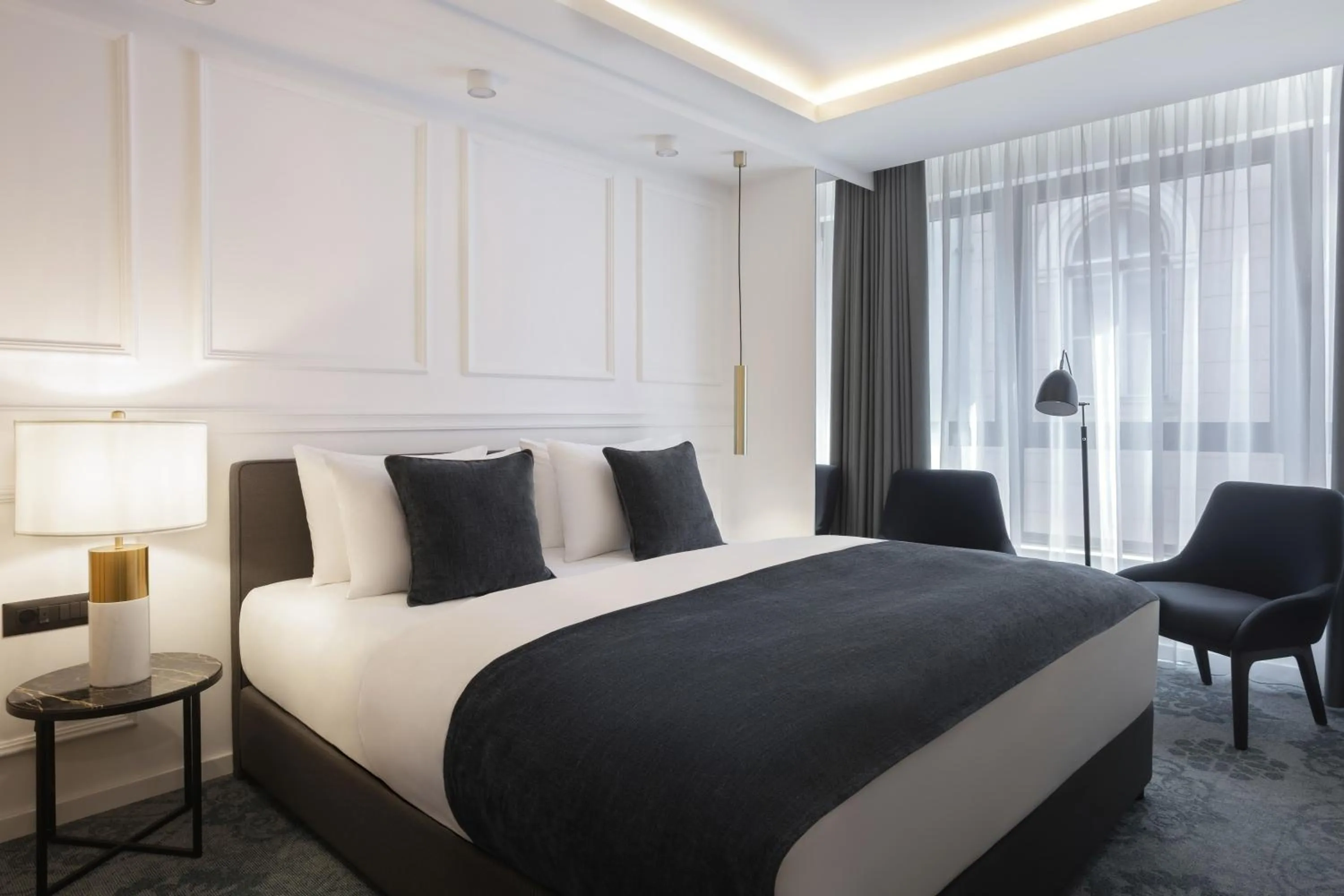 Bed in Apeiro City Avant-garde Hotel