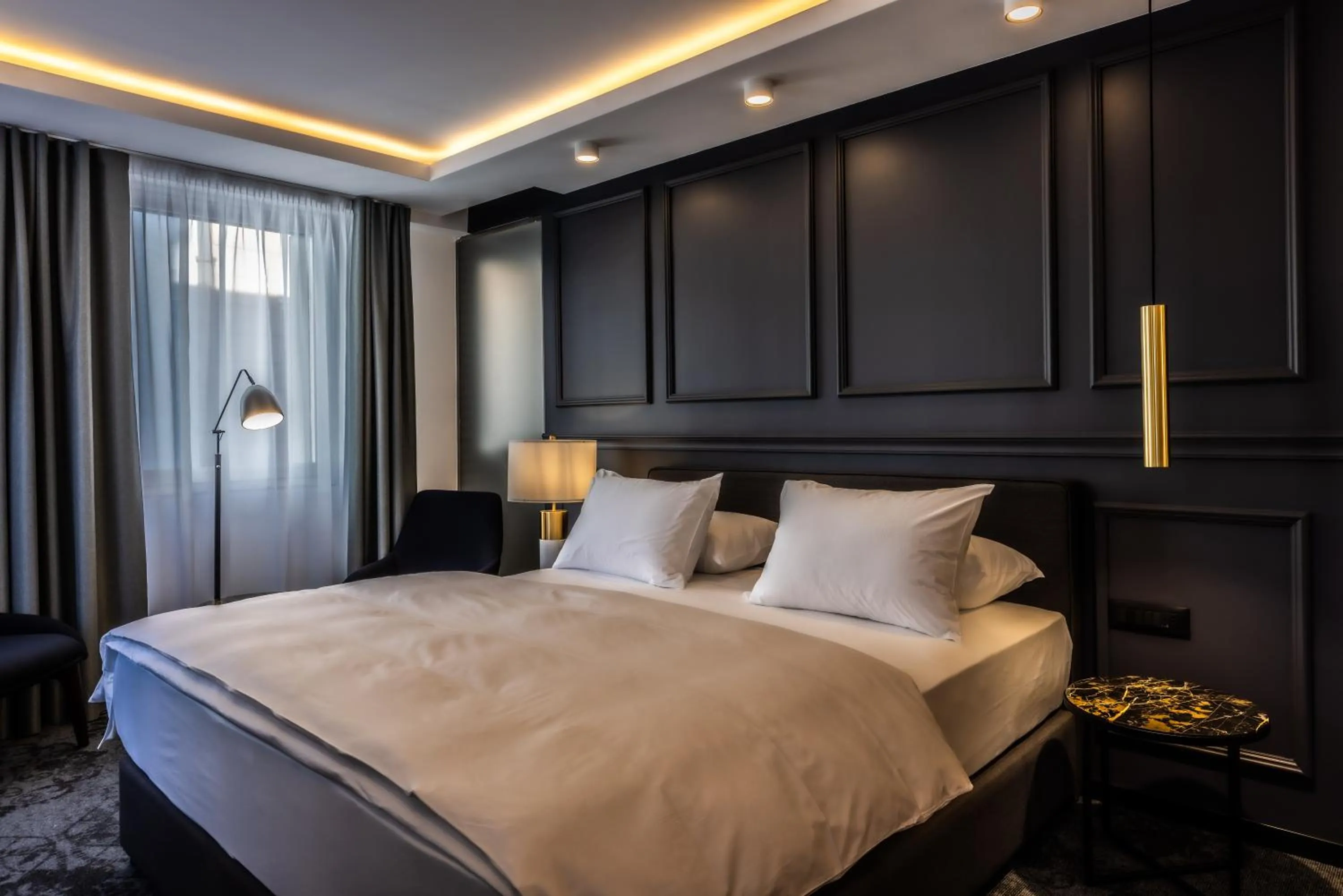 Bed in Apeiro City Avant-garde Hotel