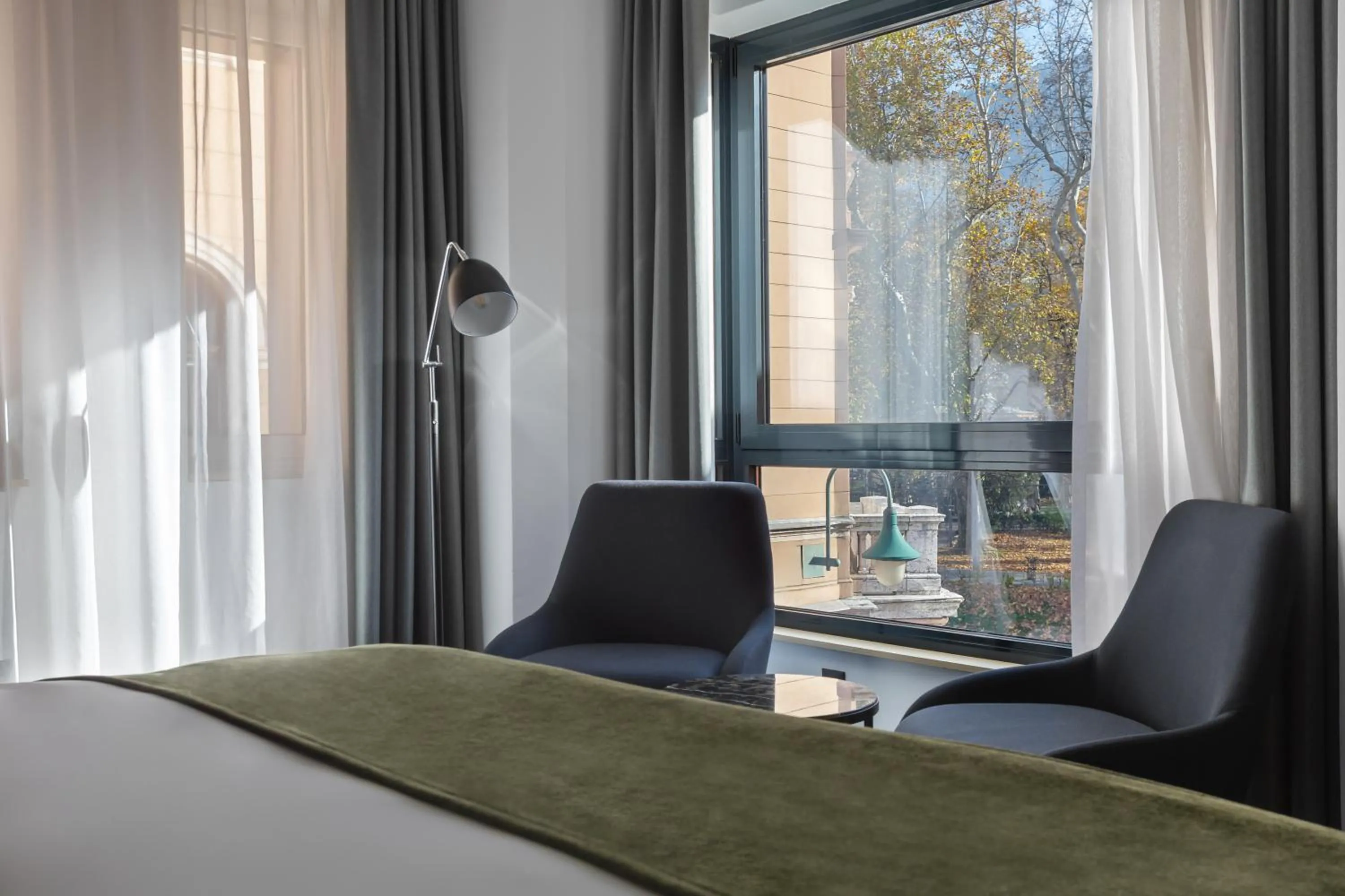 Seating area, Bed in Apeiro City Avant-garde Hotel