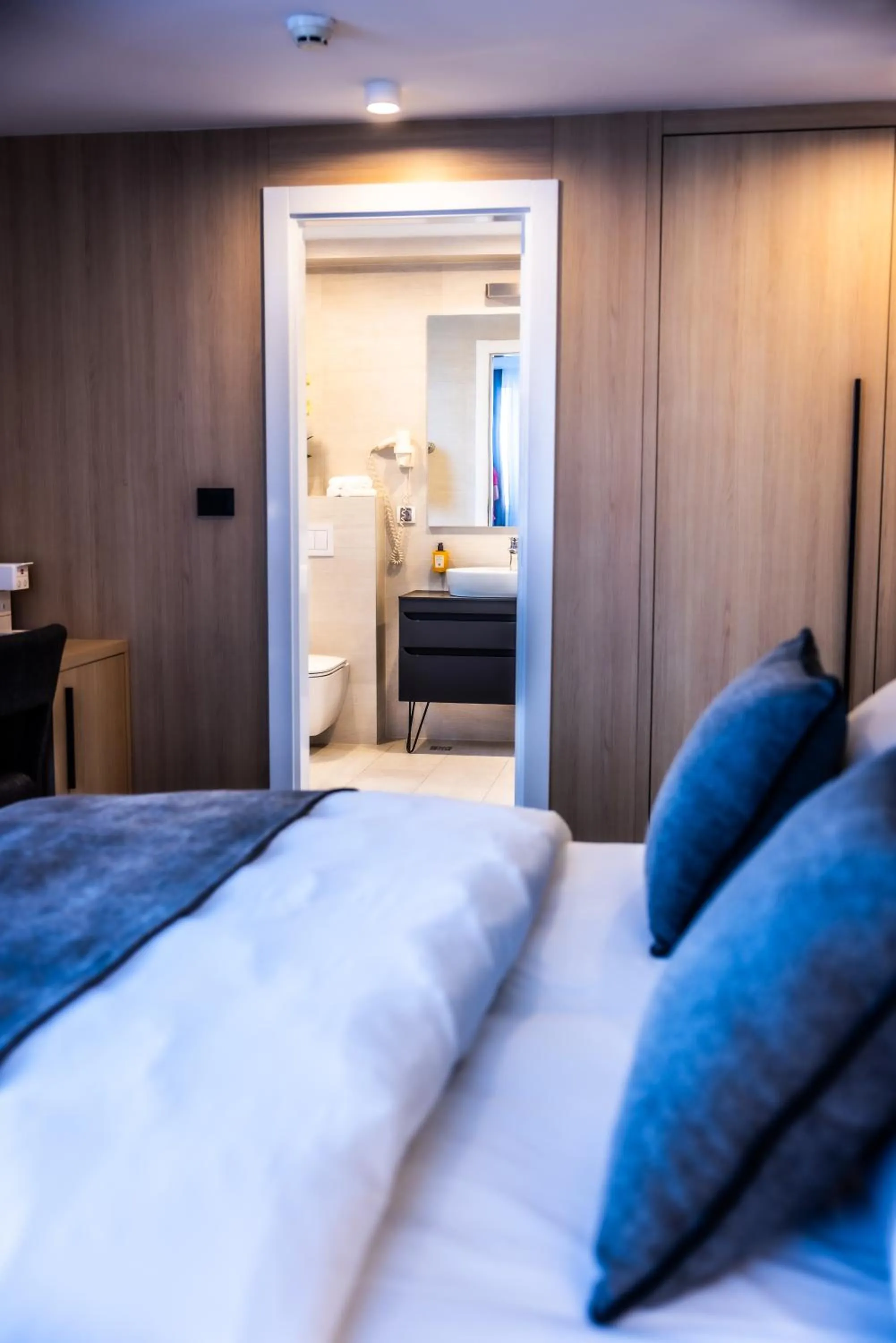 Bed in Apeiro City Avant-garde Hotel