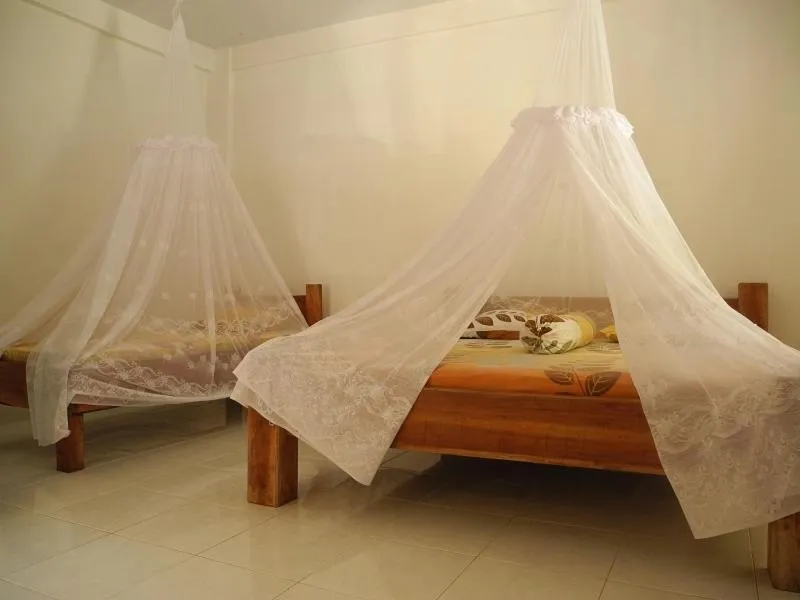 Bed in Riverside Guesthouse and Treks