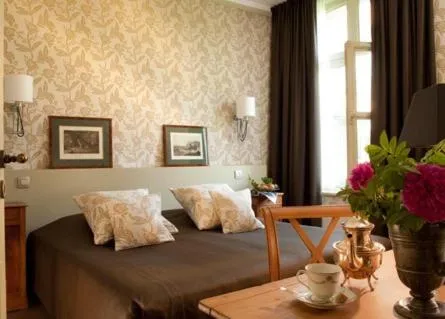 Photo of the whole room, Bed in Château De Cocove