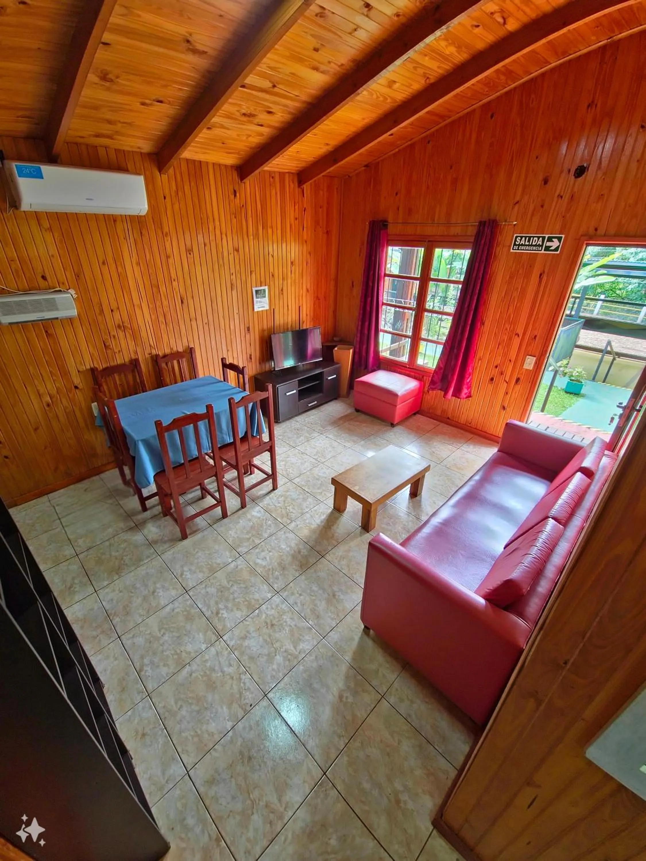 Living room, Bed in Terra Iguazú Cabañas