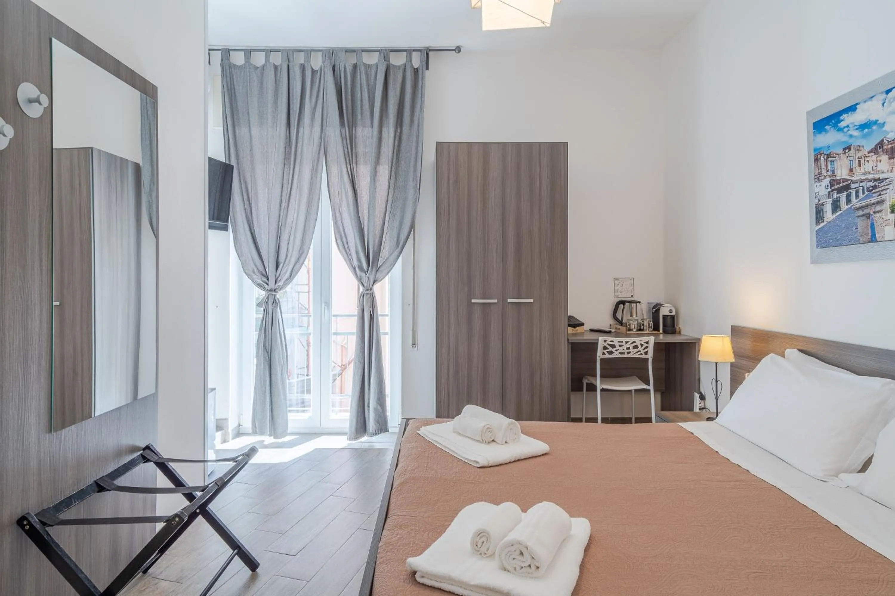 Photo of the whole room, Bed in Cavour Rooms