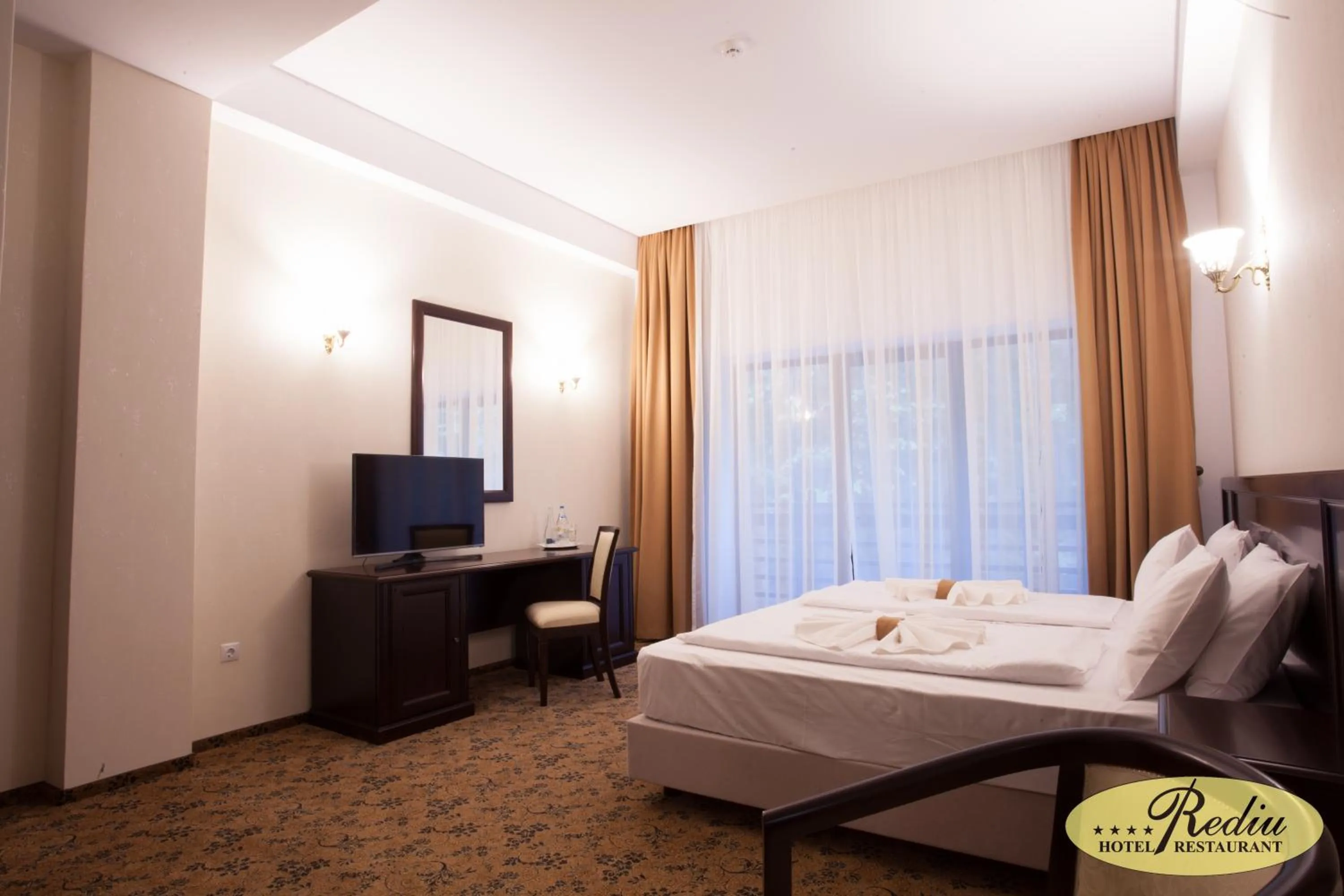 Photo of the whole room, Bed in Rediu Hotel & Restaurant