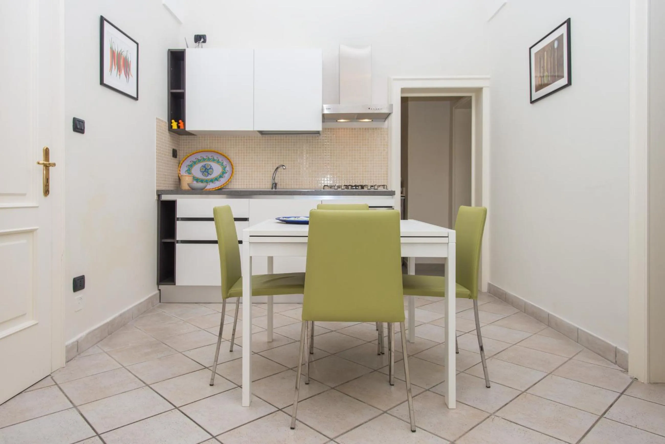 Kitchen or kitchenette in Il Garbino Suite and Apartment