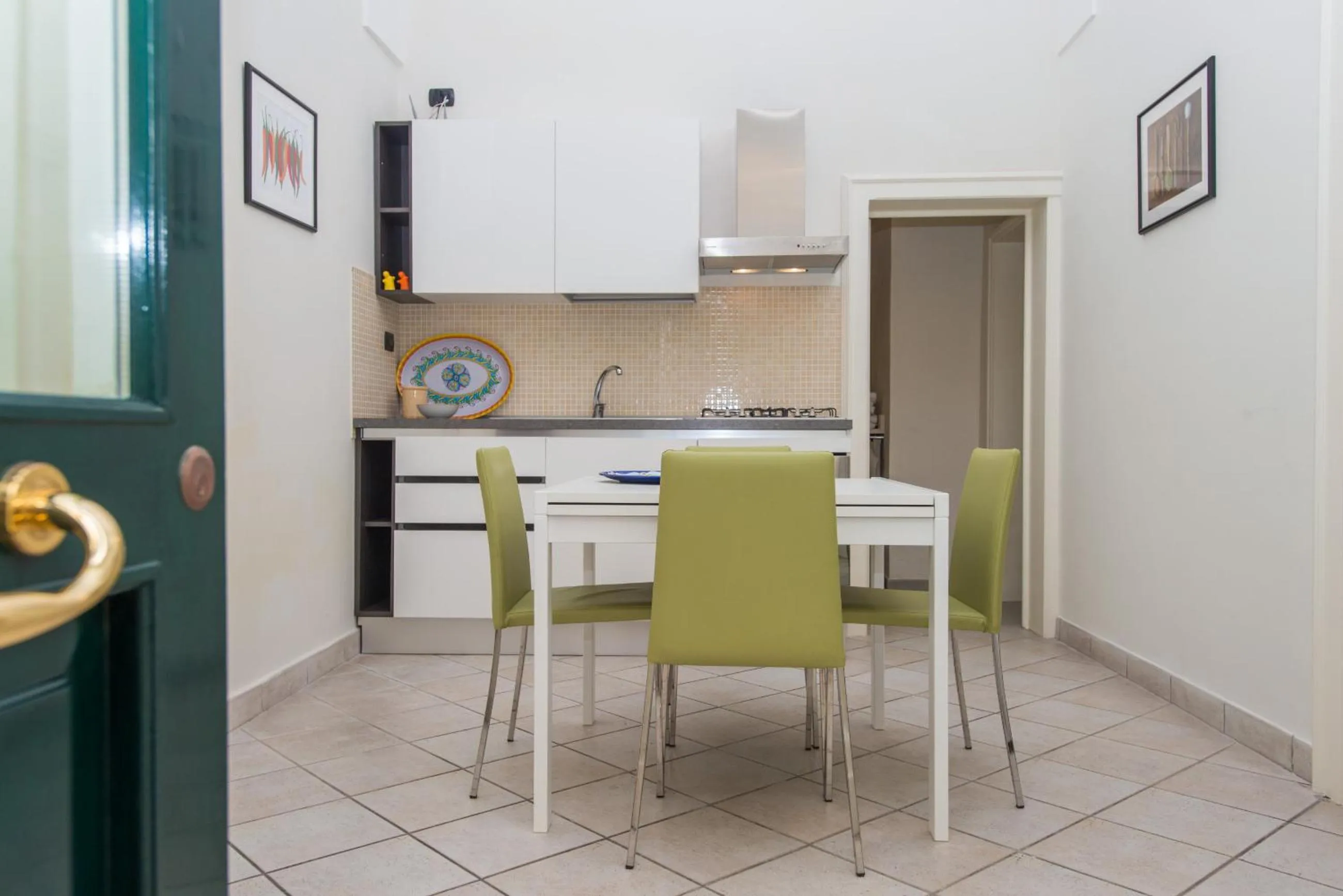 Kitchen or kitchenette in Il Garbino Suite and Apartment