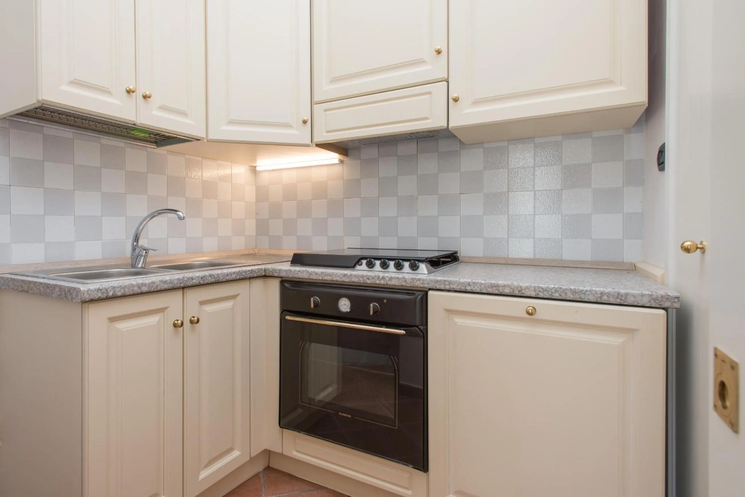 Kitchen or kitchenette in Il Garbino Suite and Apartment