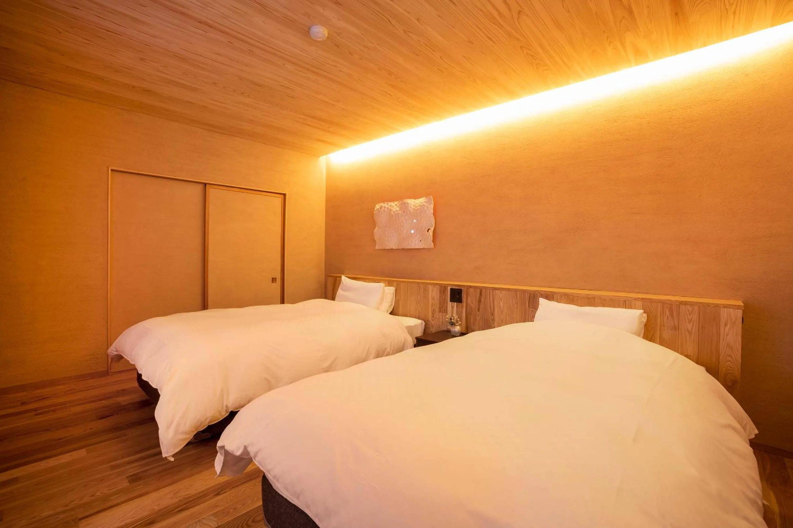 Bed in Ichiraku tendo spa & brewery