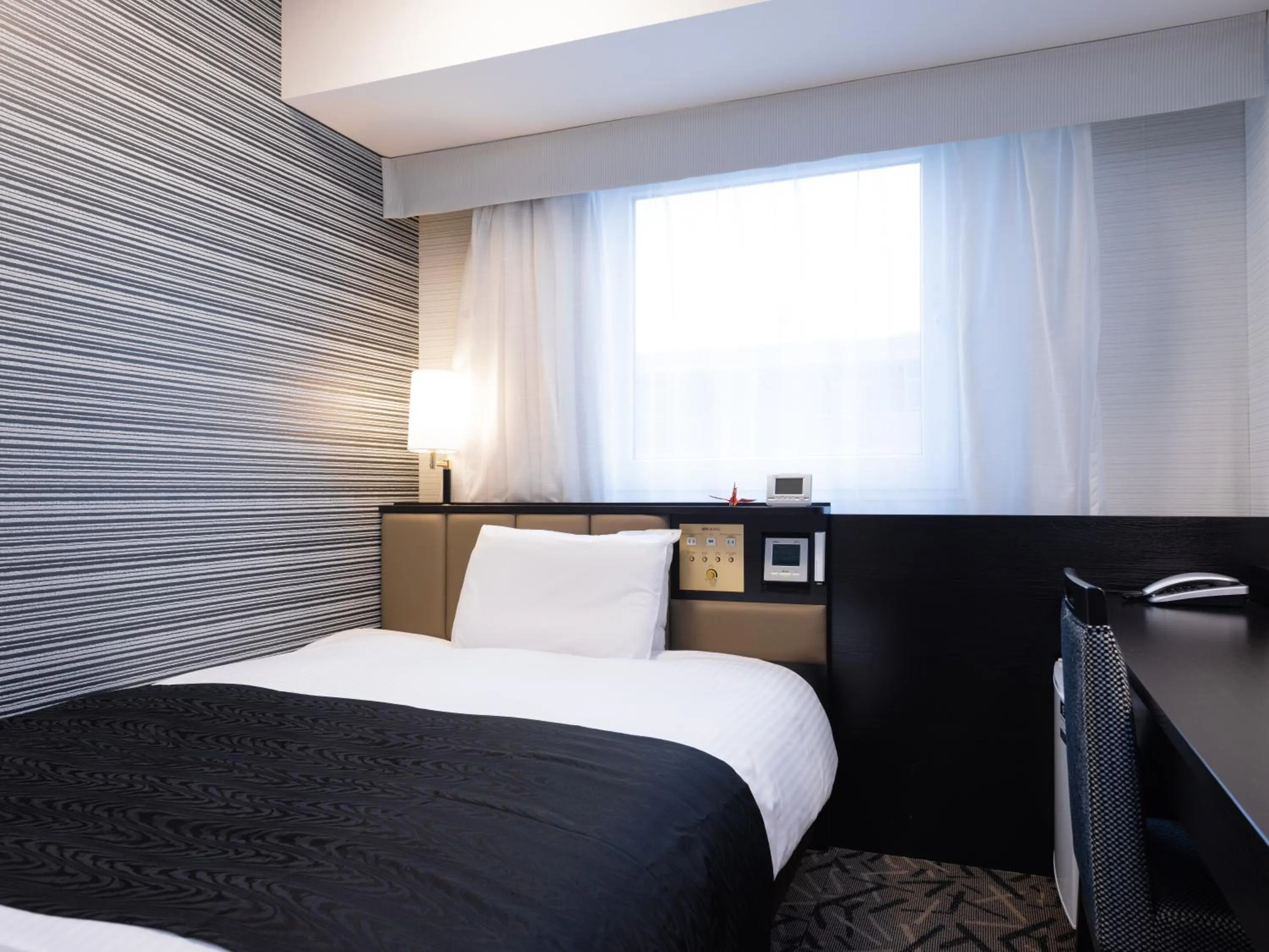 Photo of the whole room, Bed in APA Hotel Fukushima Ekimae