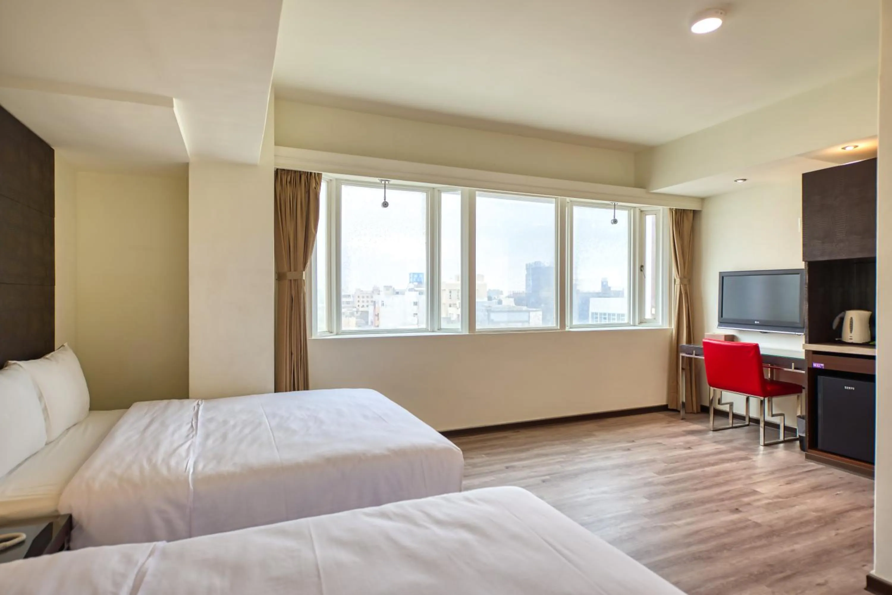 Bed in Jih Lih Hotel