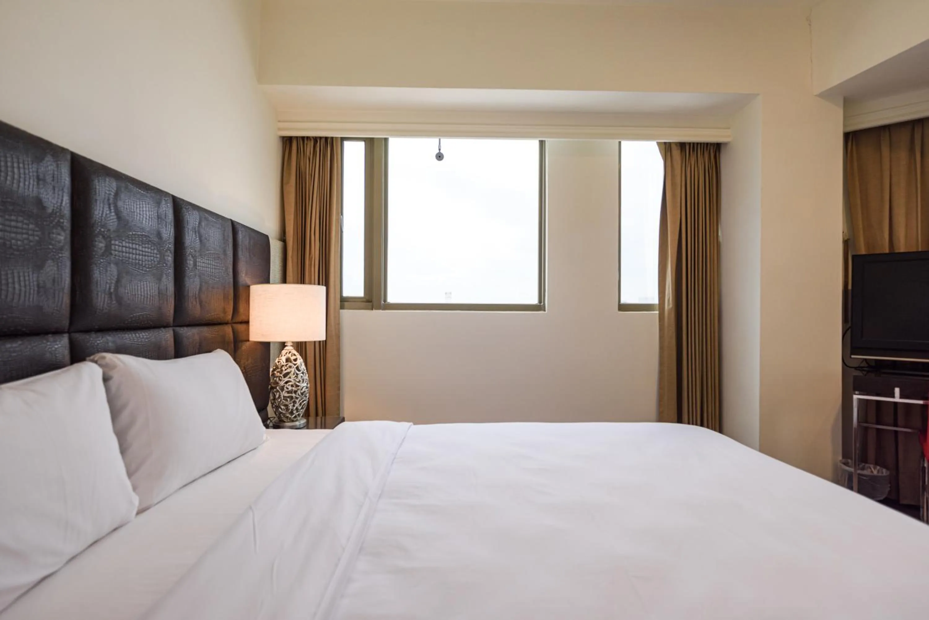 Bed in Jih Lih Hotel