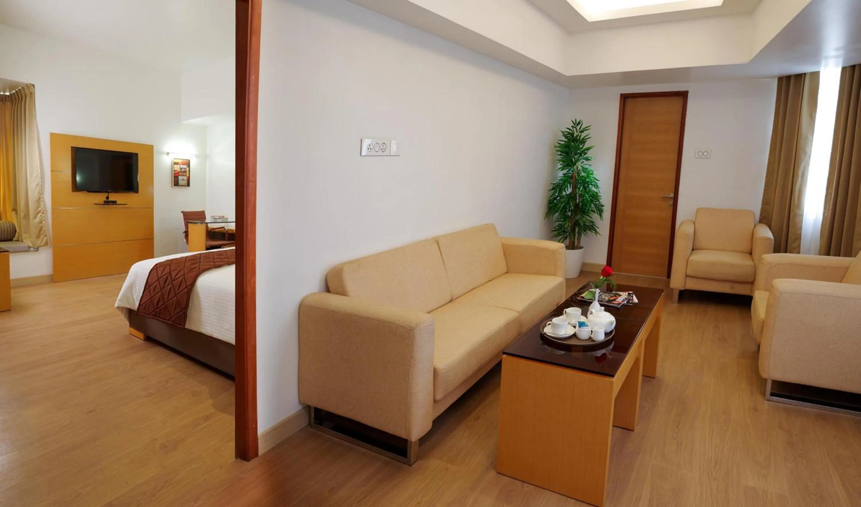 Seating area, Bed in The Central Residency