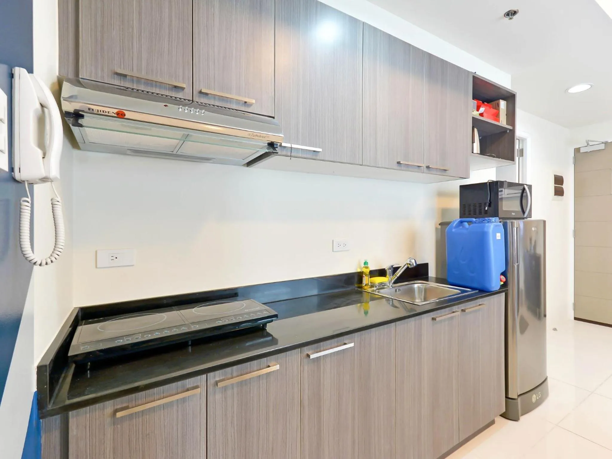 Kitchen or kitchenette in Currency Serviced Suites
