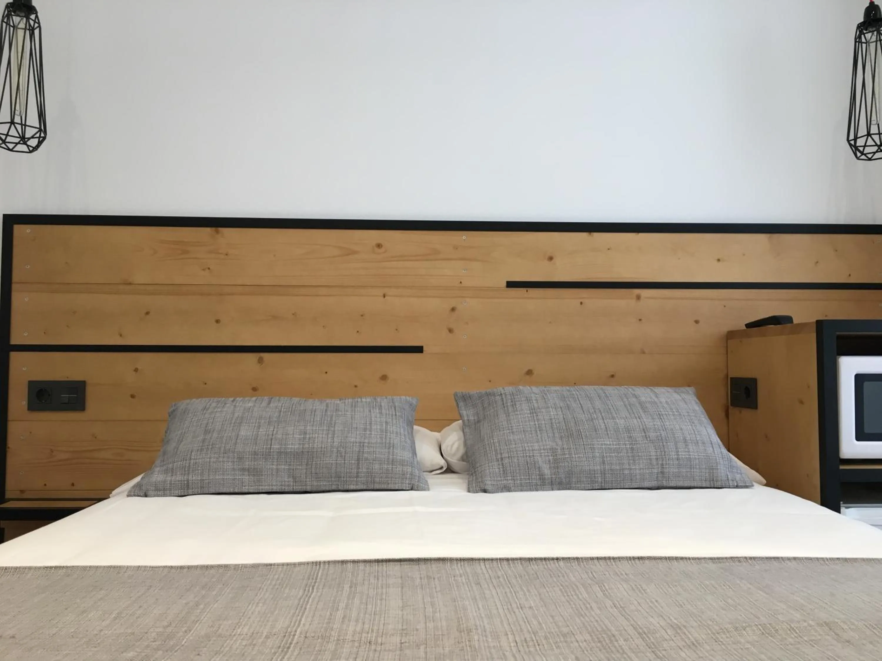 Photo of the whole room, Bed in Pensión La Perla