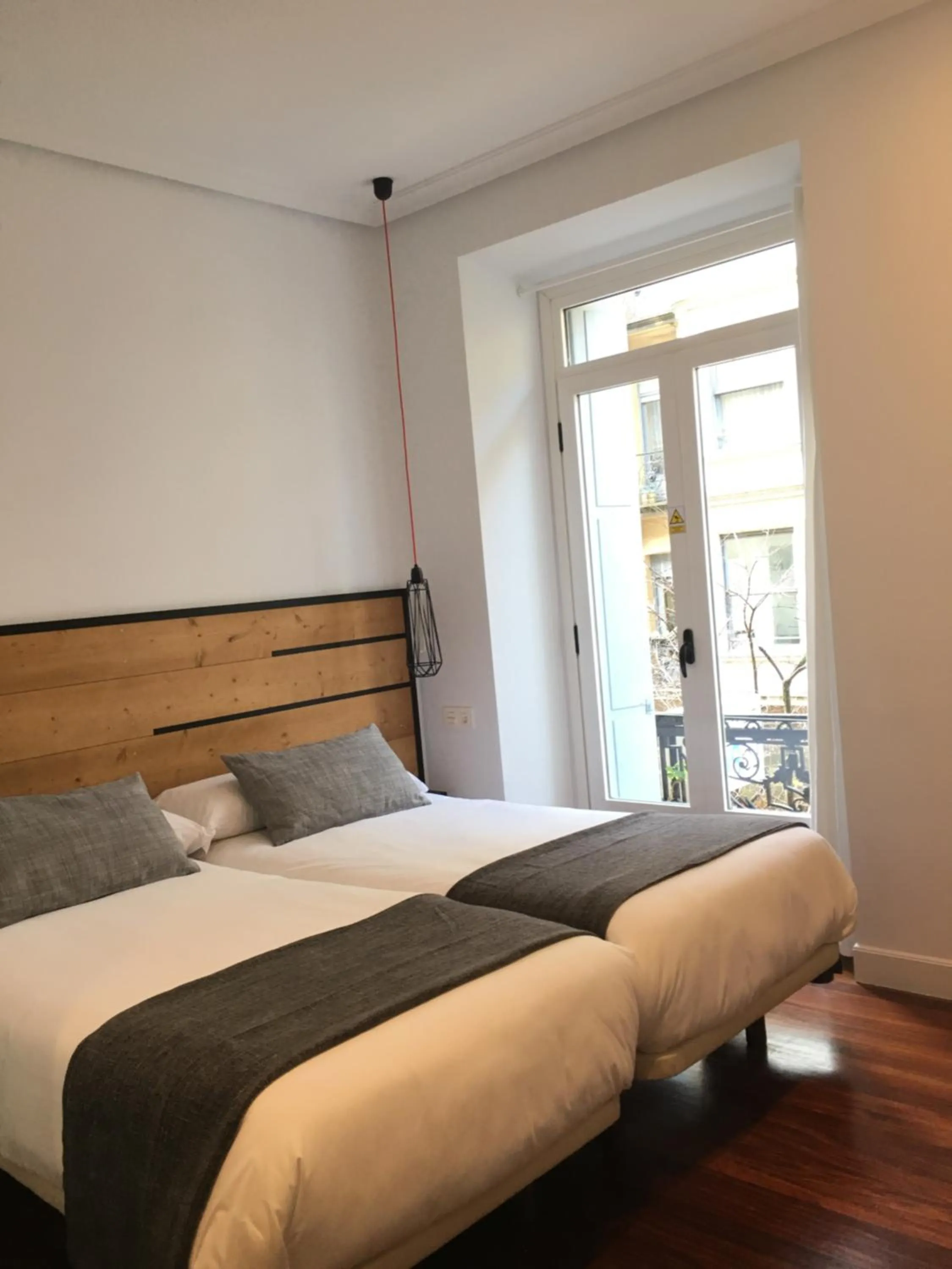 Photo of the whole room, Bed in Pensión La Perla