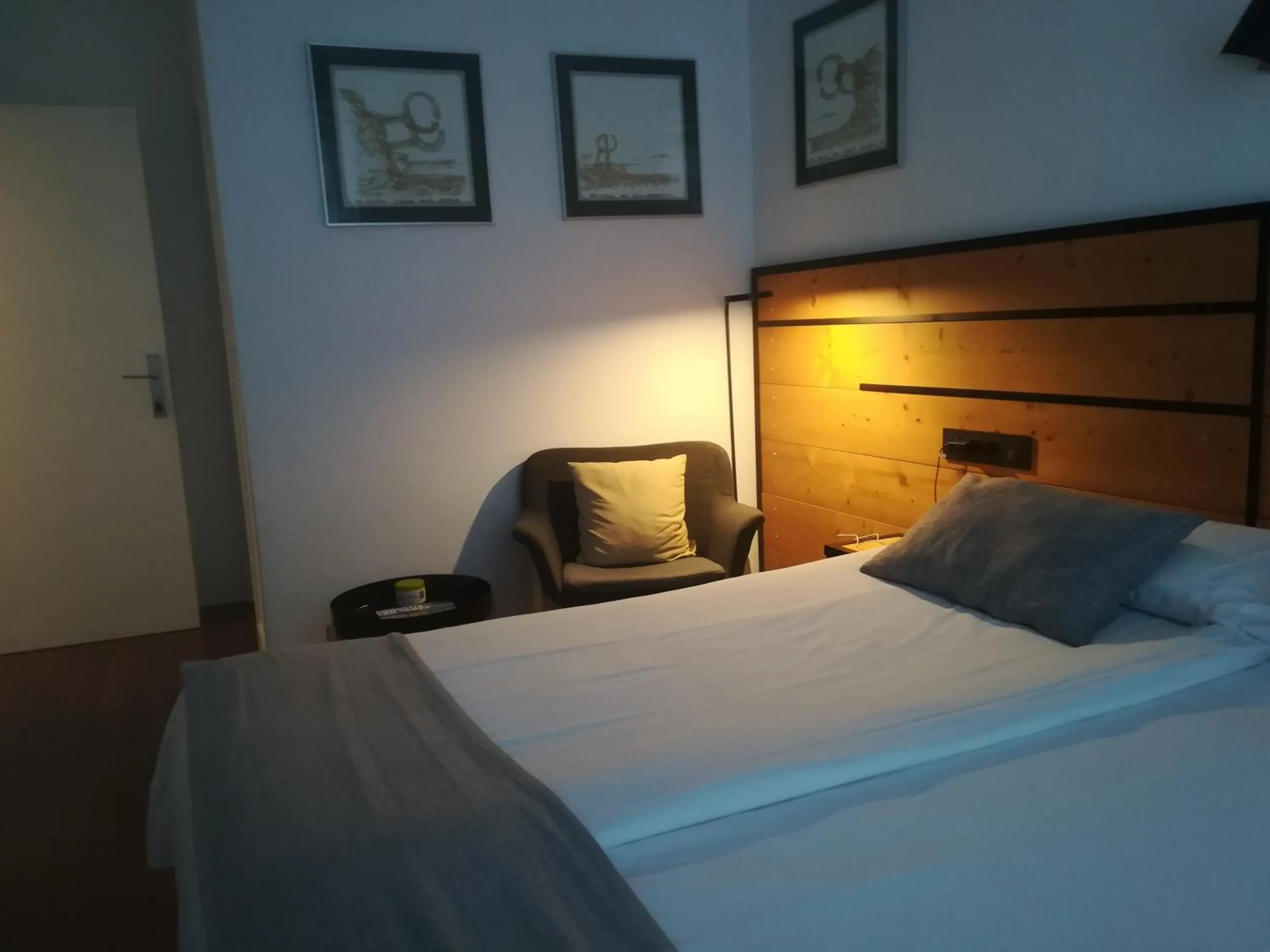 Living room, Bed in Pensión La Perla