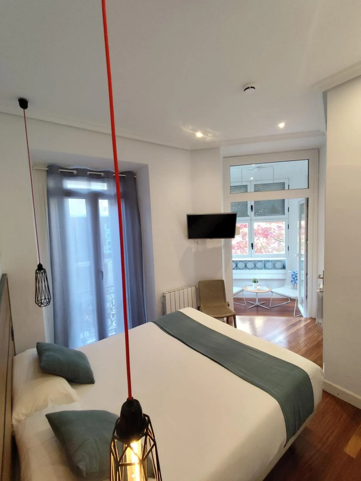 Photo of the whole room, Bed in Pensión La Perla