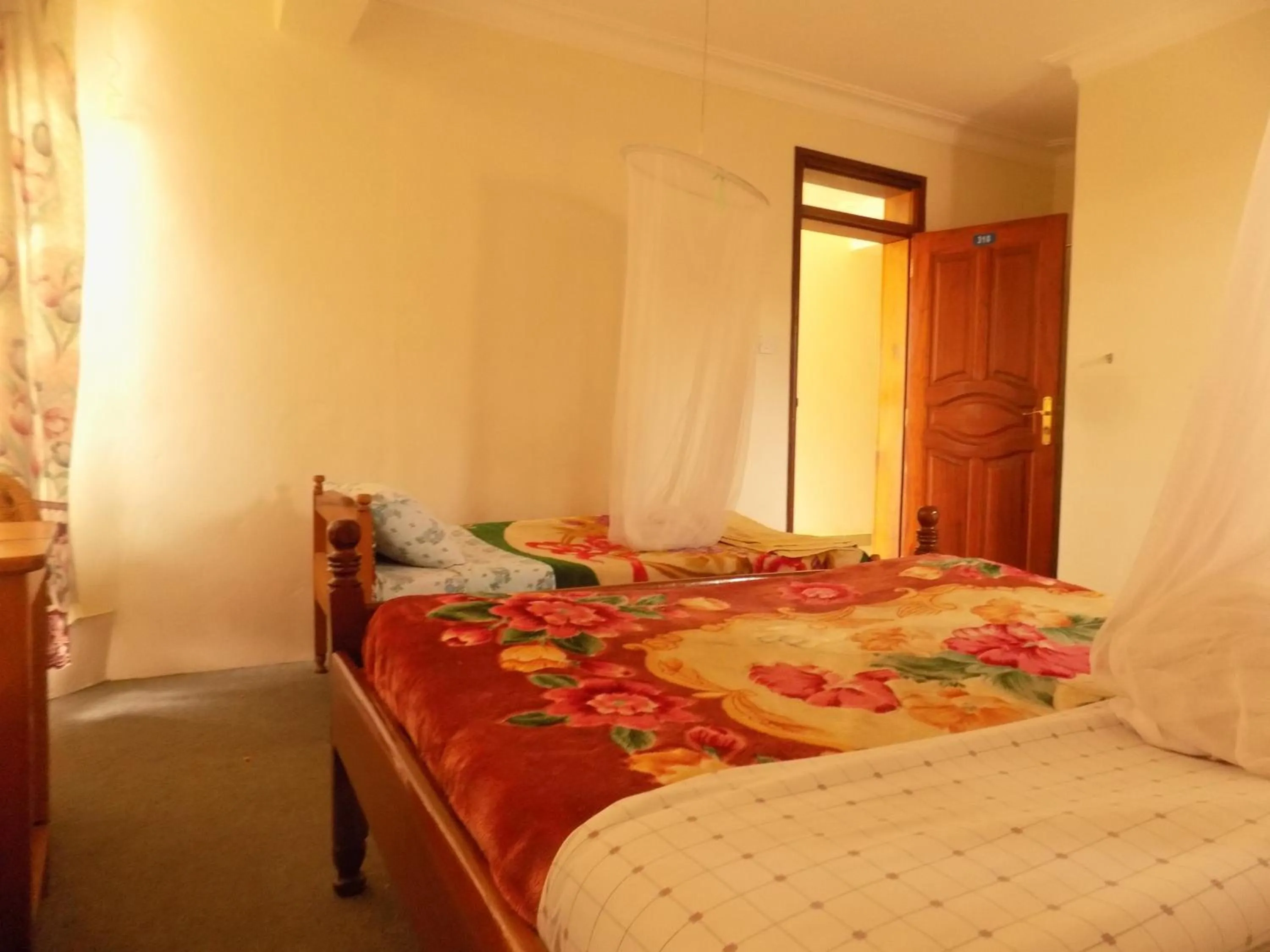 Bed in Meliva Guest House Mbarara