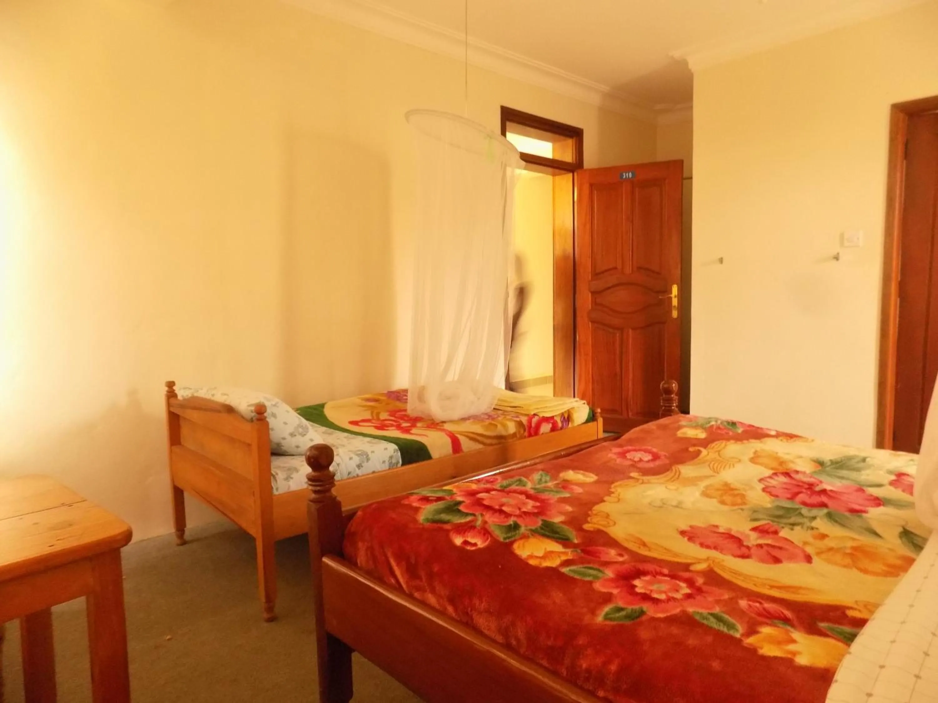 Bed in Meliva Guest House Mbarara