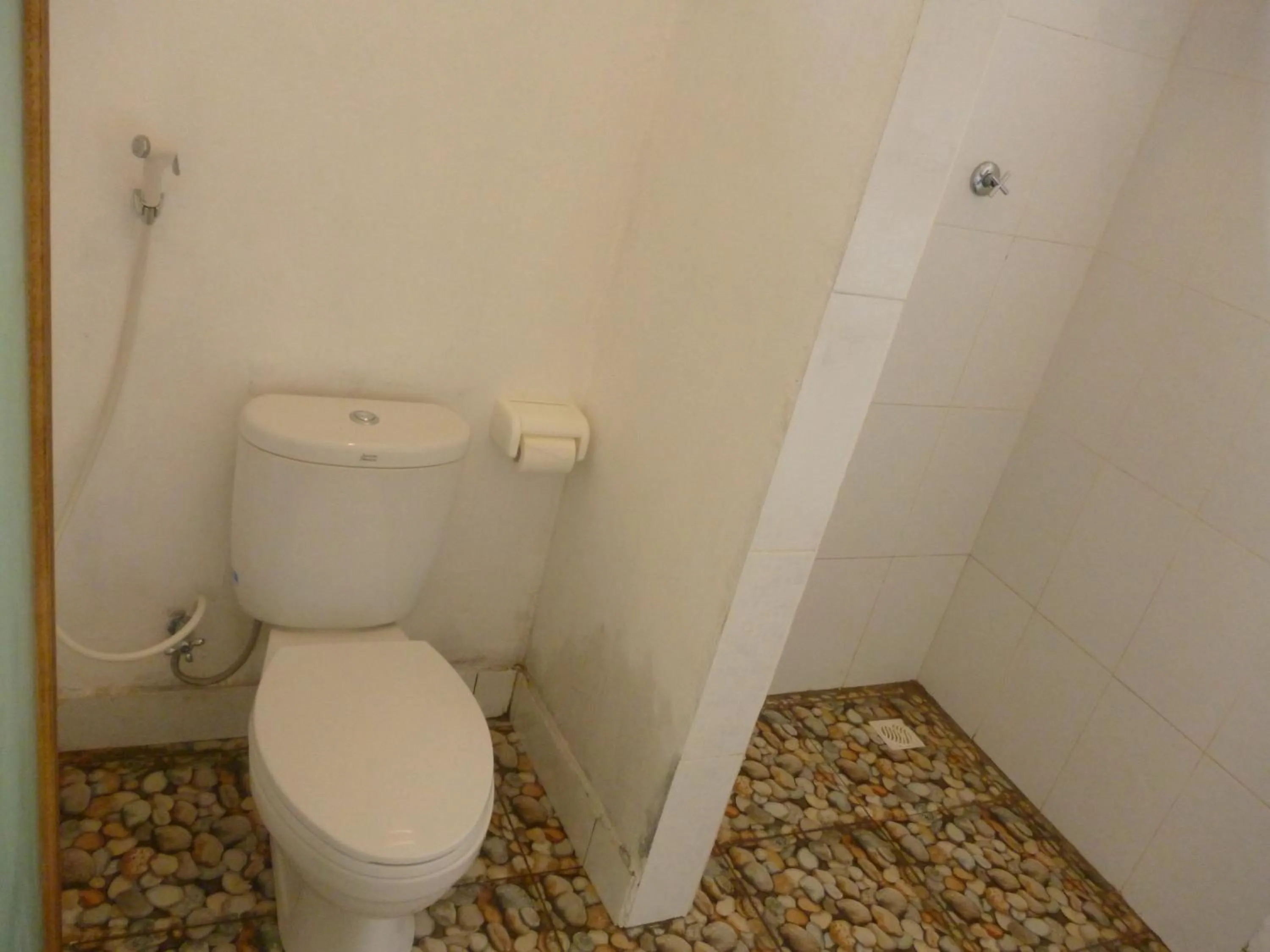 Bathroom in Dewi Garden Guesthouse