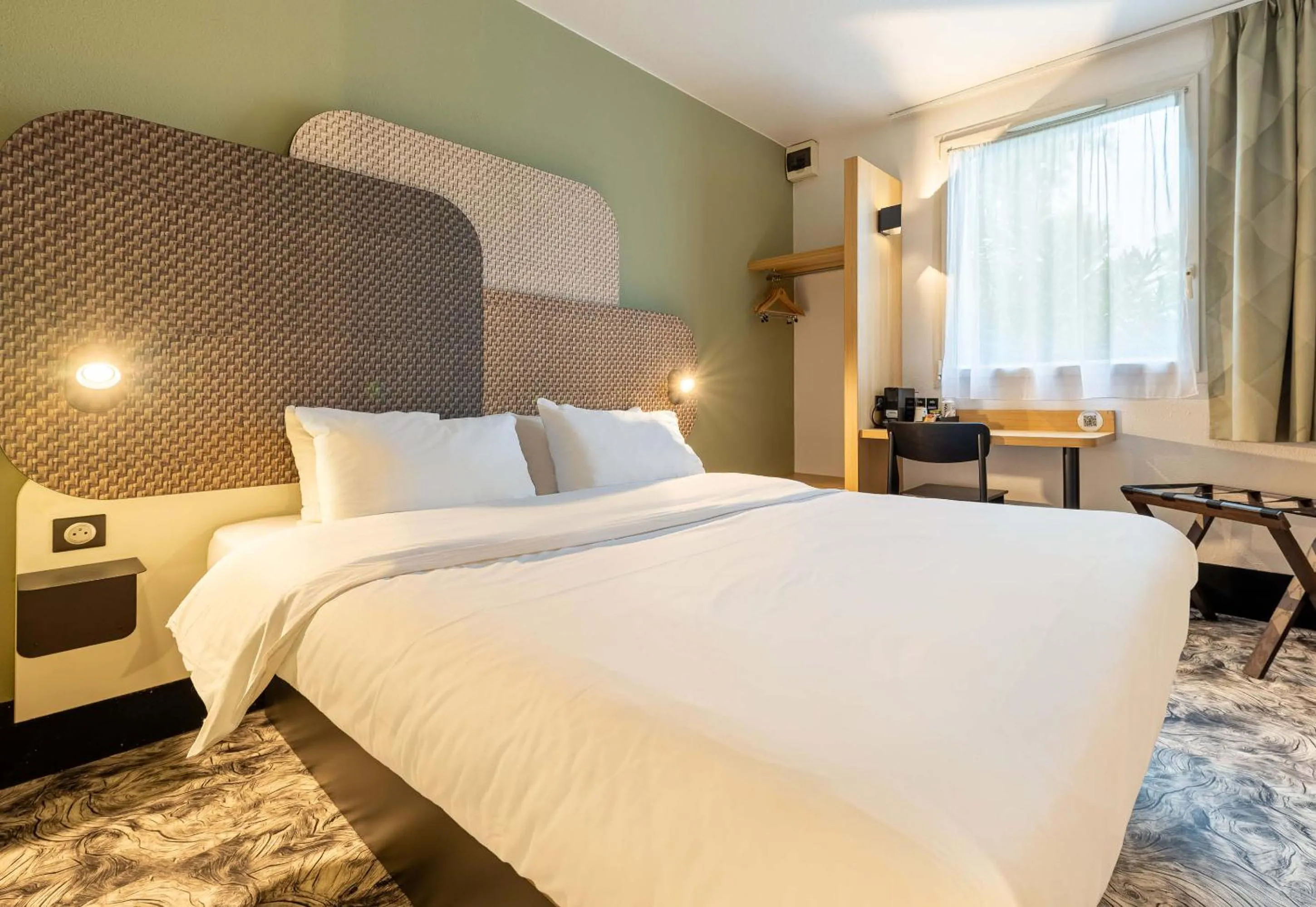 Bed in B&B HOTEL Nantes Atlantis Le Zenith