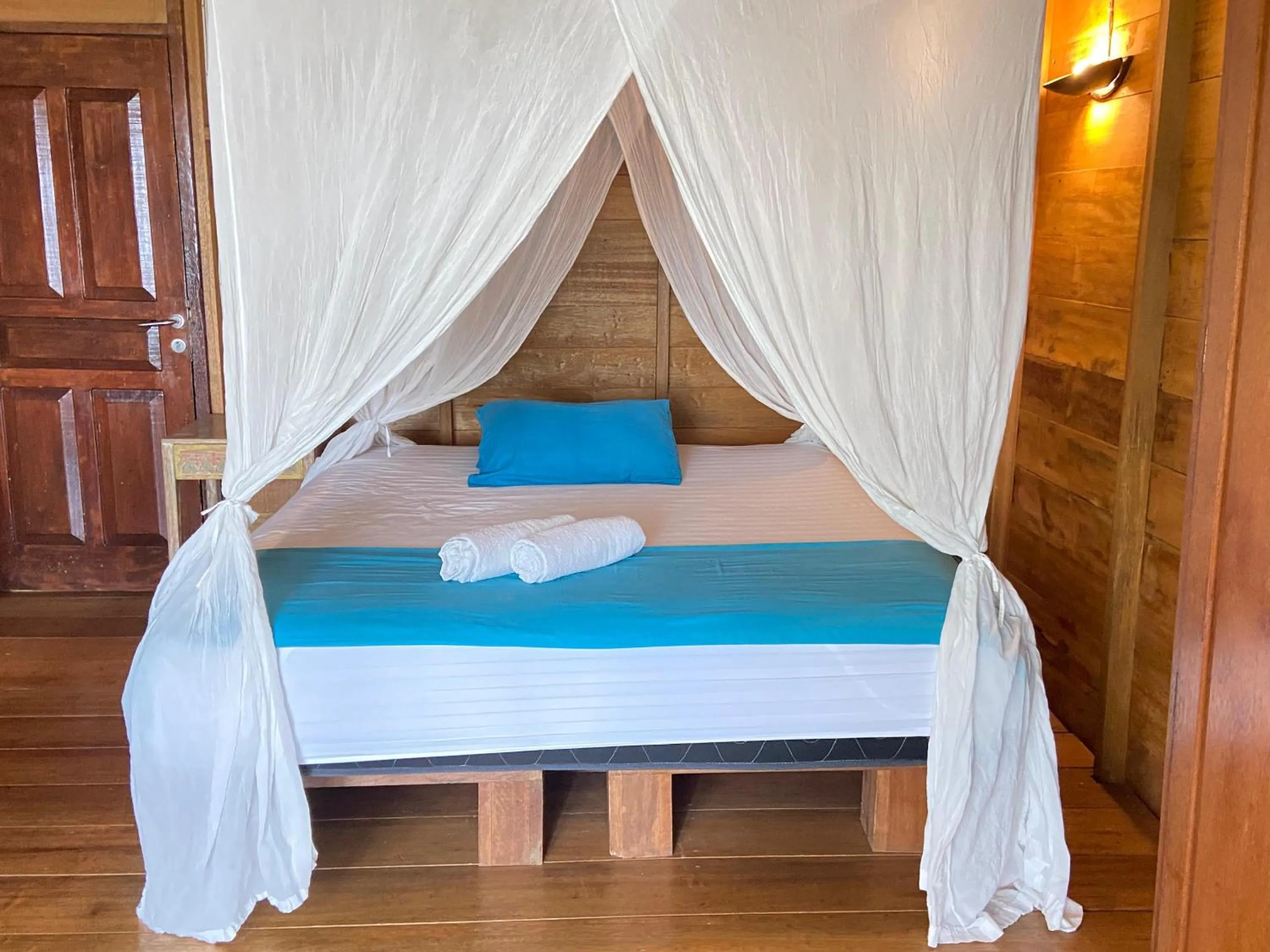 Bed in Casa Nemo Beach Resort & Spa