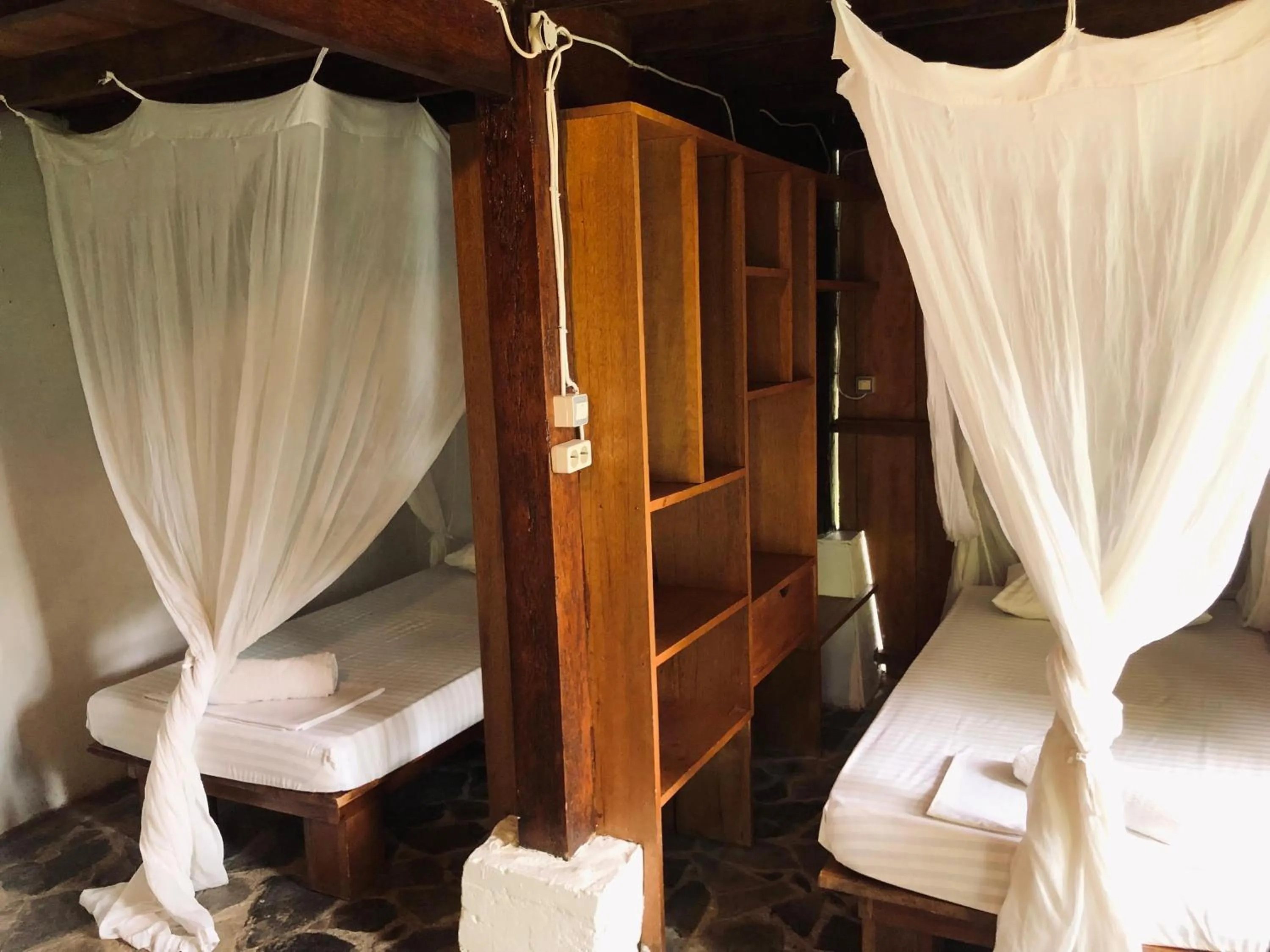 Bed in Casa Nemo Beach Resort & Spa