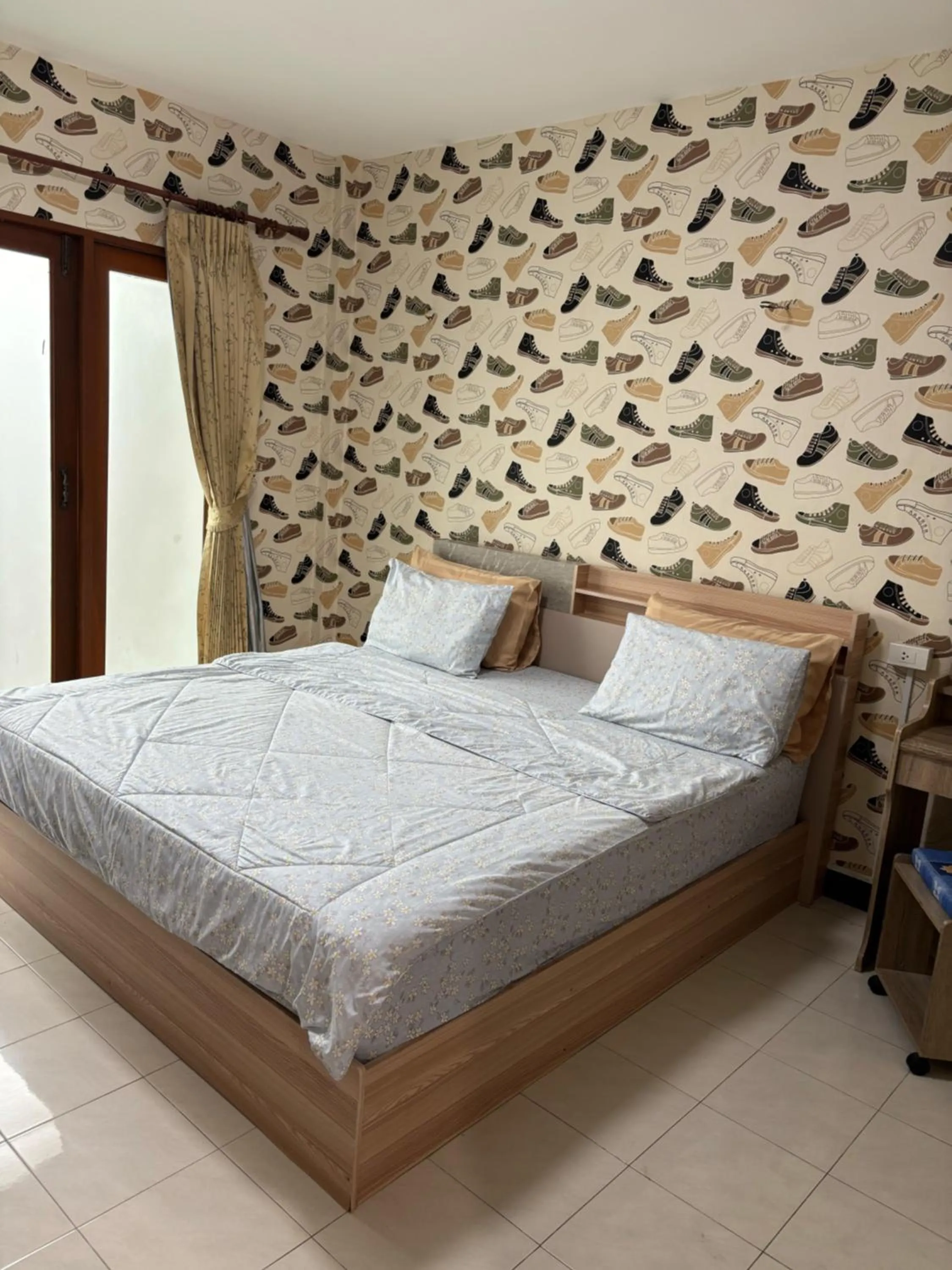 Bed in Baan Dara Resort