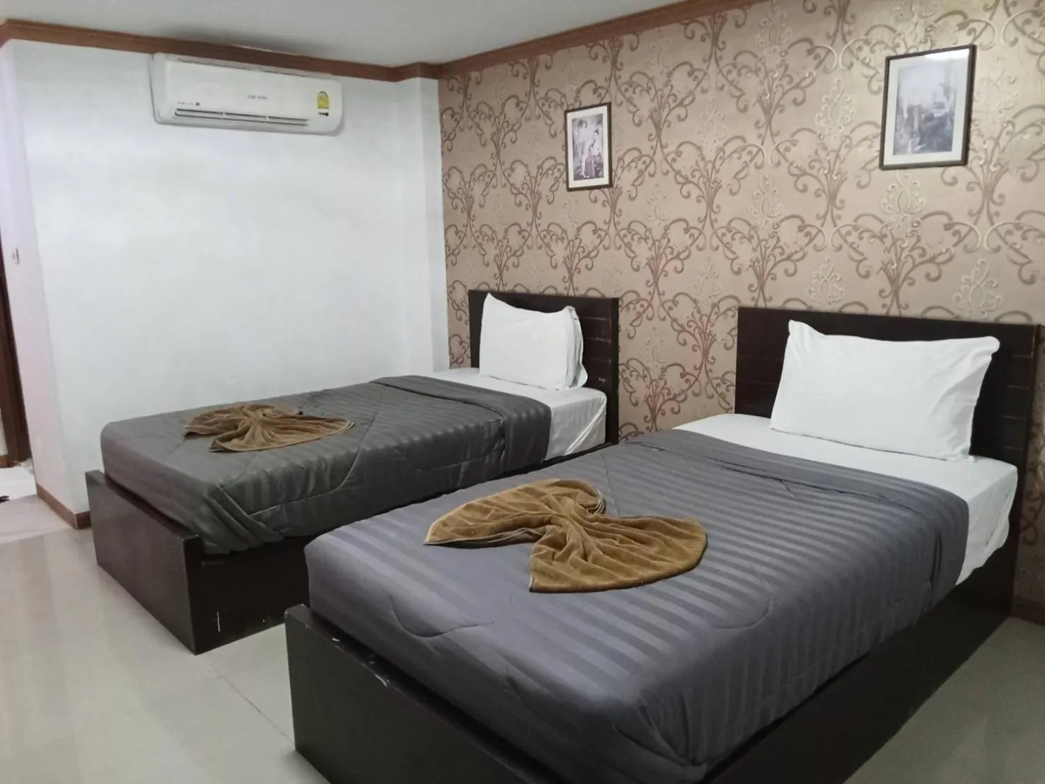 Bed in PS Hotel Saraburi