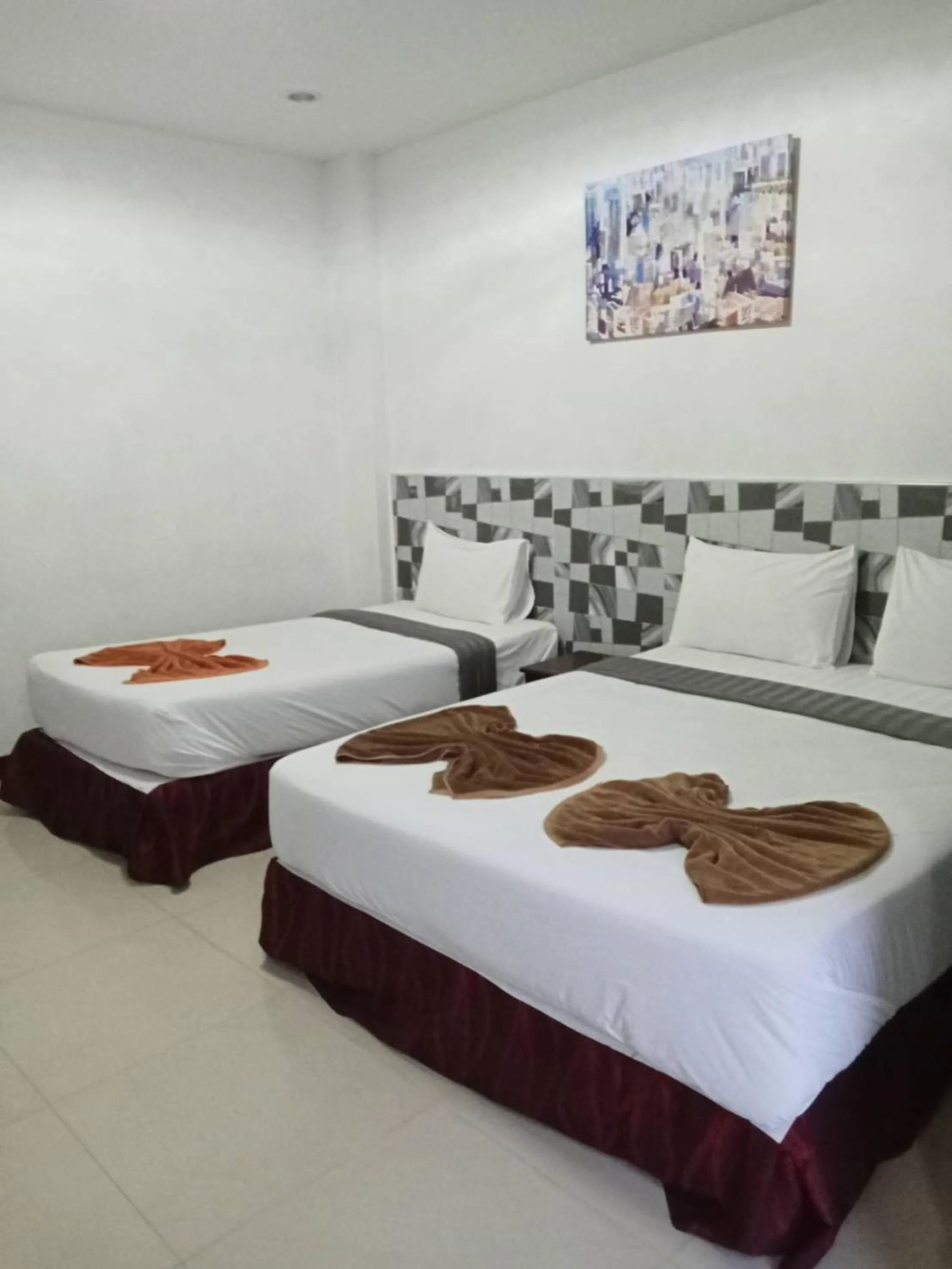 Bed in PS Hotel Saraburi