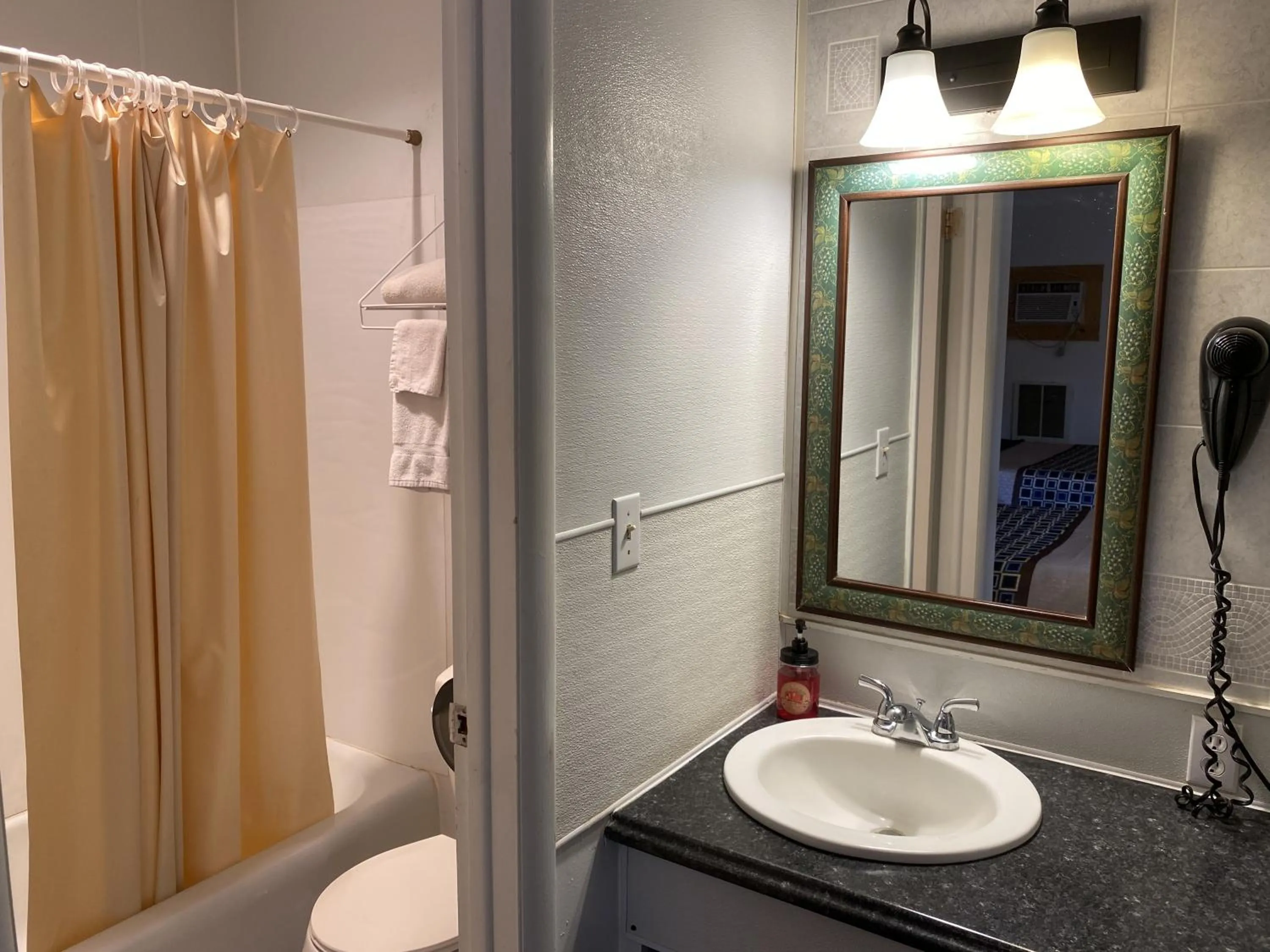 Shower in Knights Inn Fairview