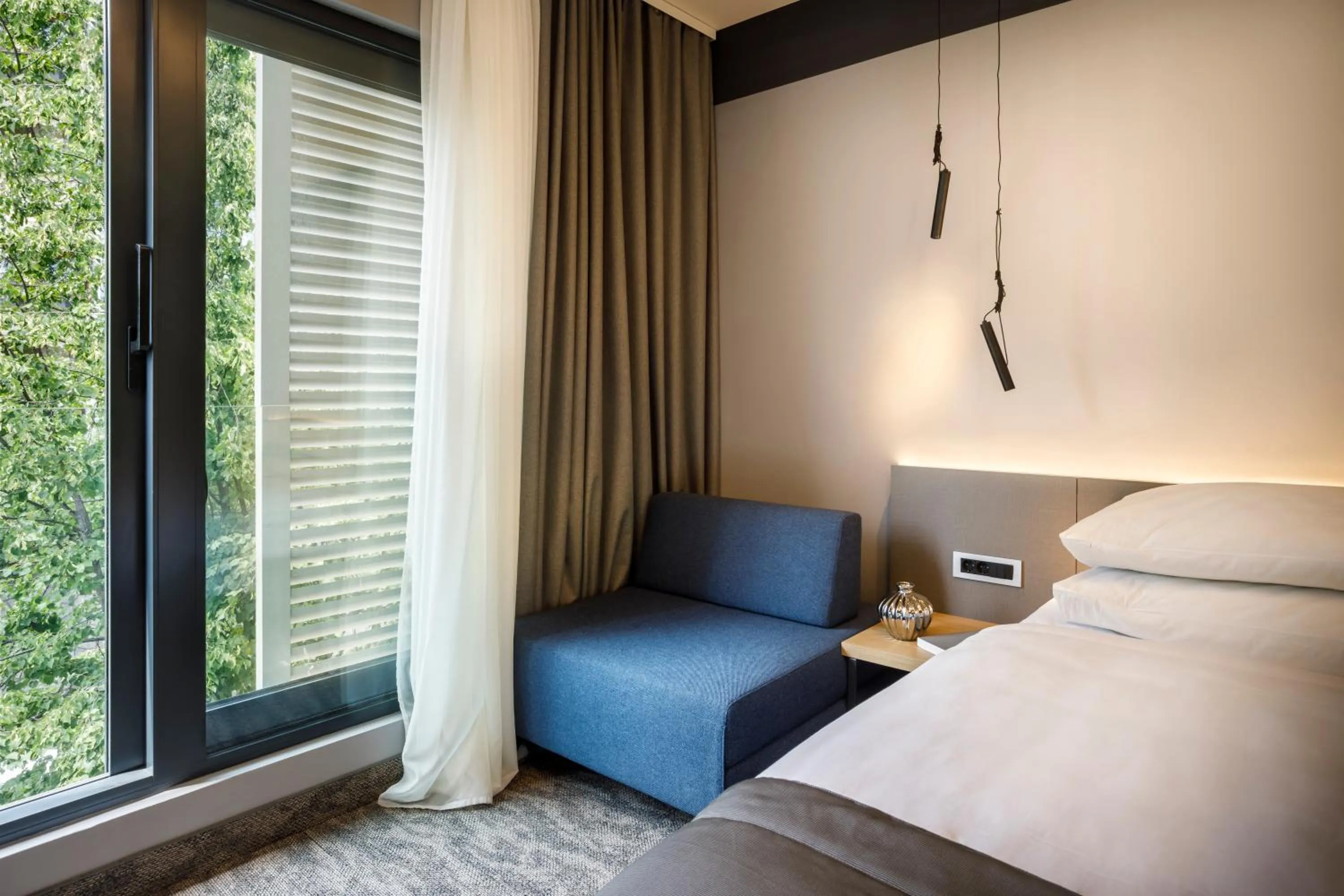 Seating area, Bed in Hotel Istra - Liburnia