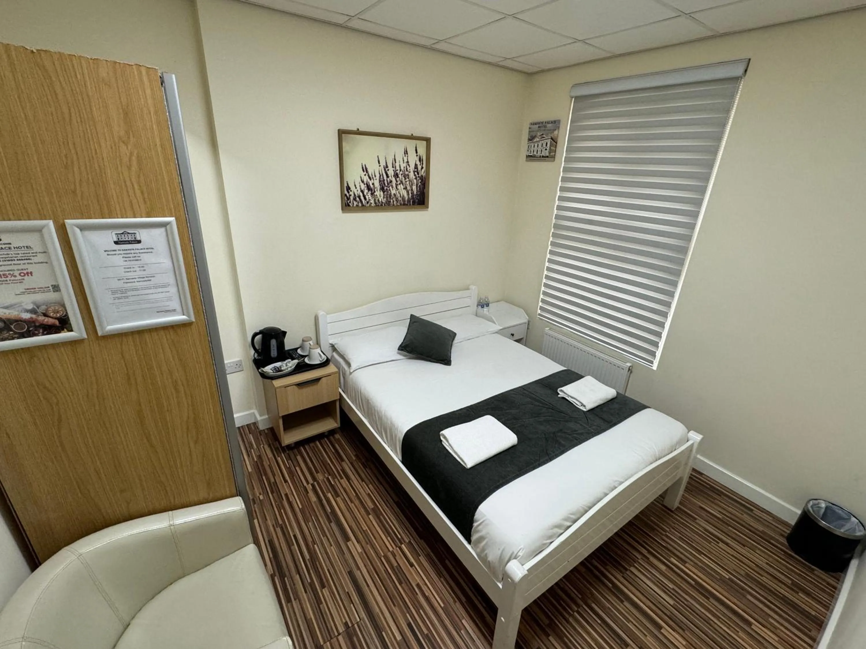 Bed in Namaste Palace Hotel