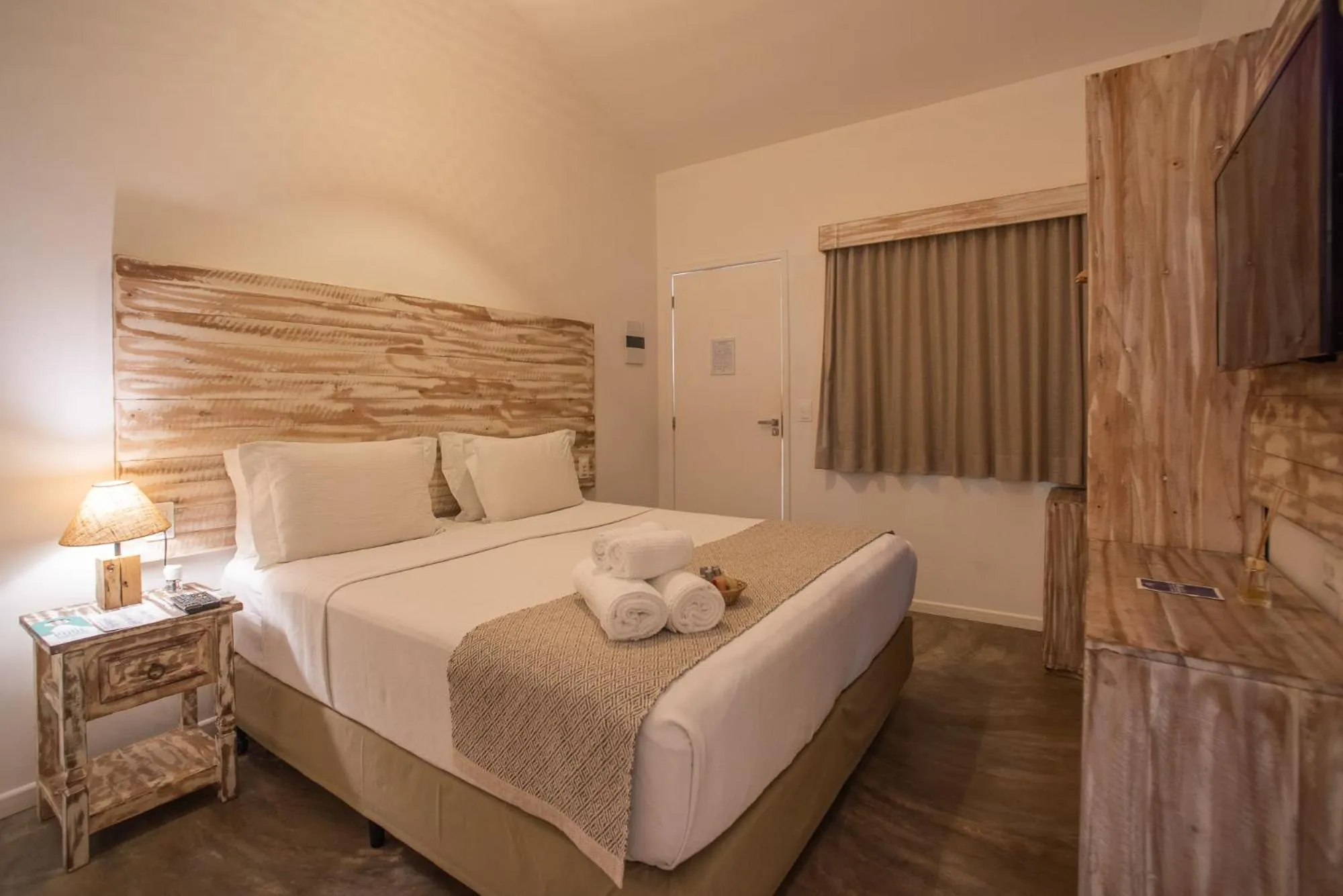 Bed in Pousada Tubarão