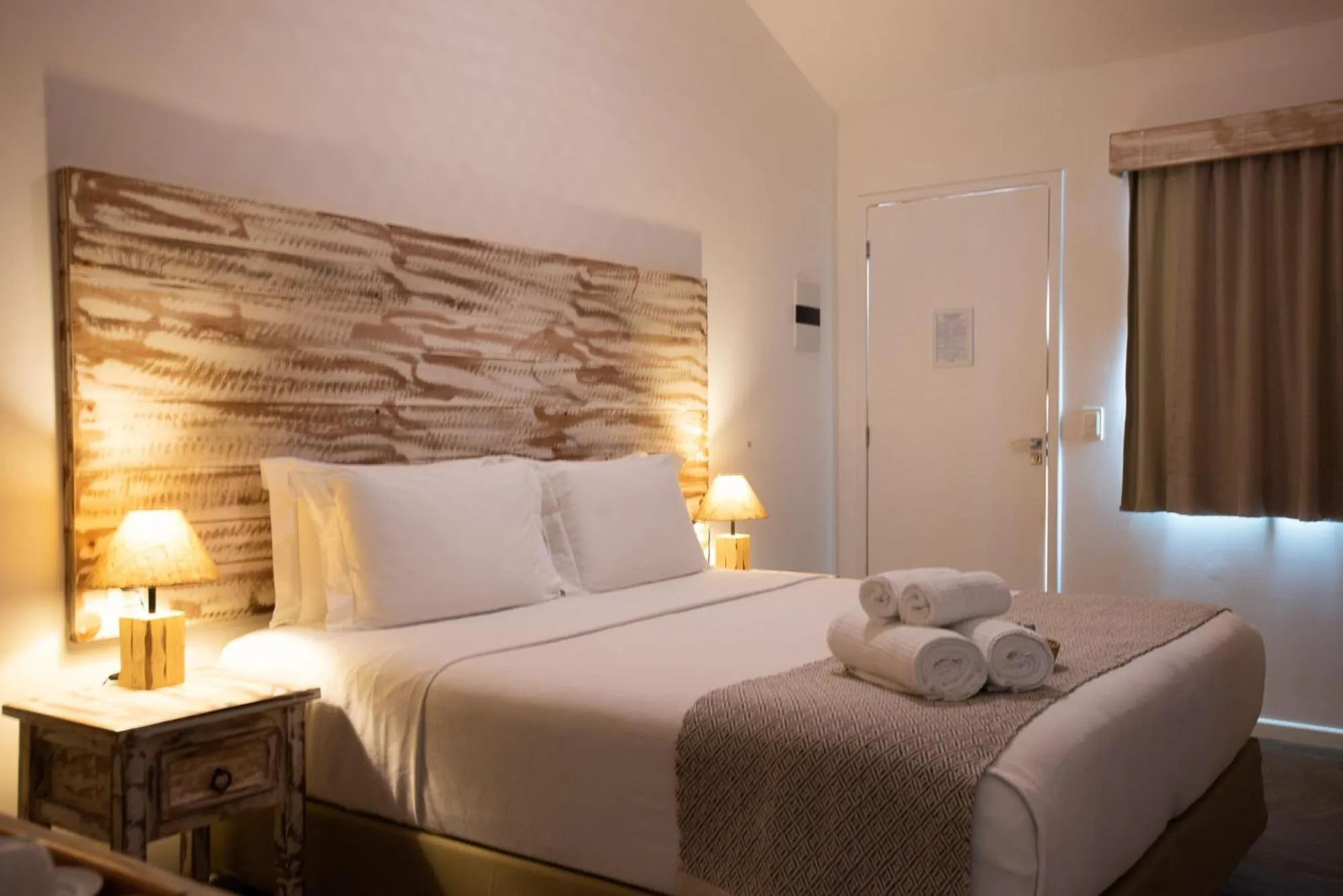 Bed in Pousada Tubarão