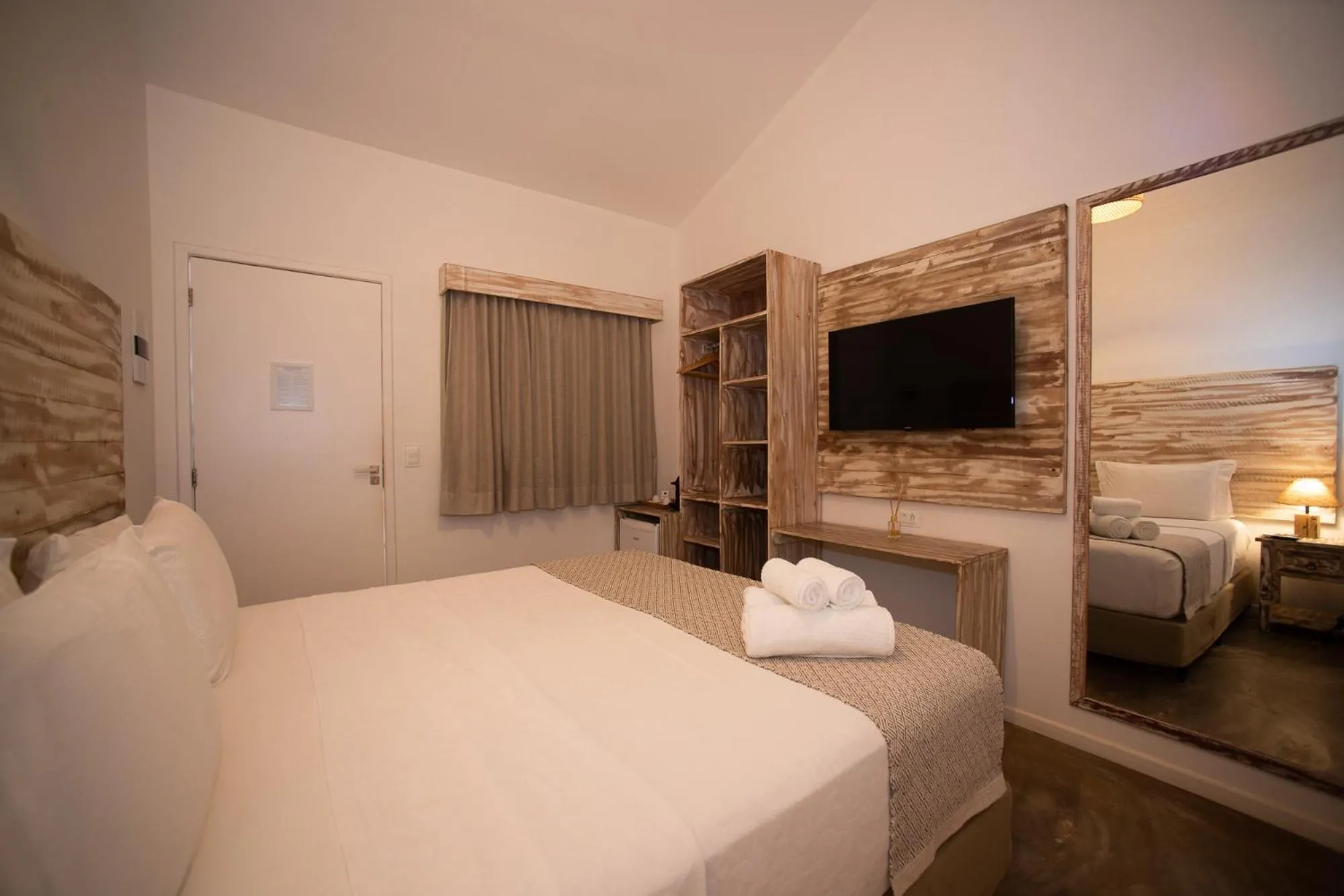 Bed in Pousada Tubarão