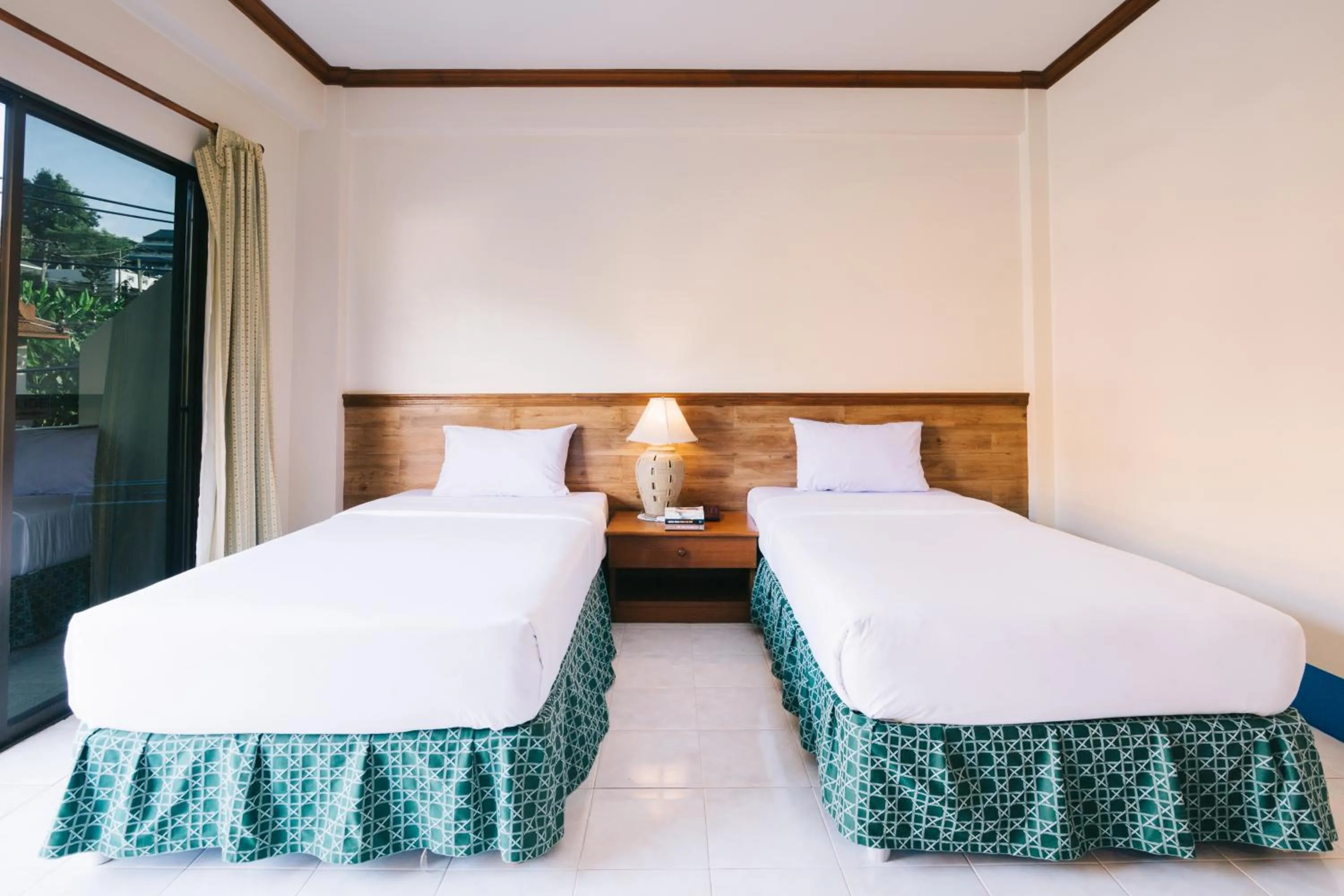 Bed in Kata Sun Beach Hotel