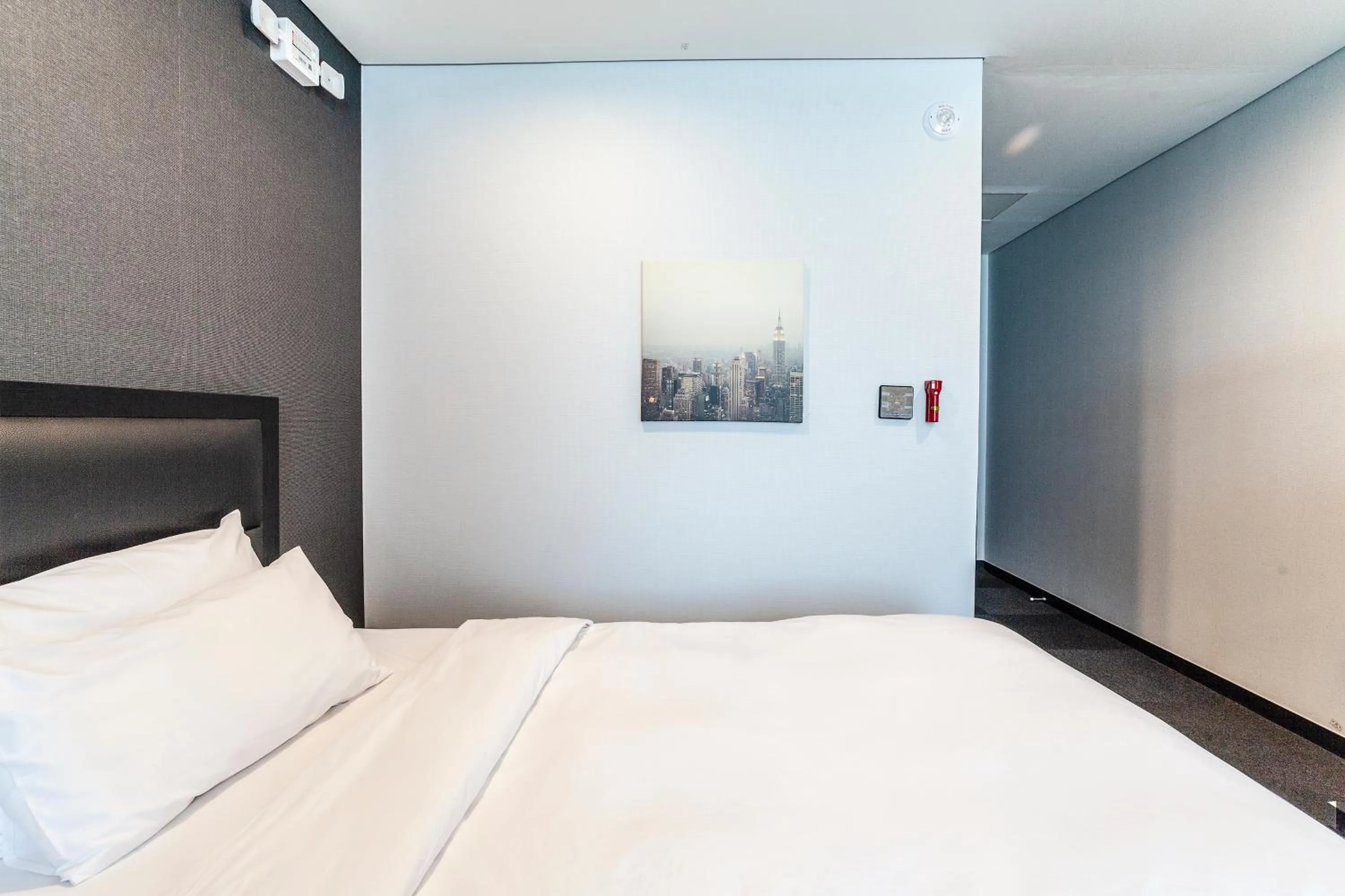 Bed in Gangneung Tourist Hotel