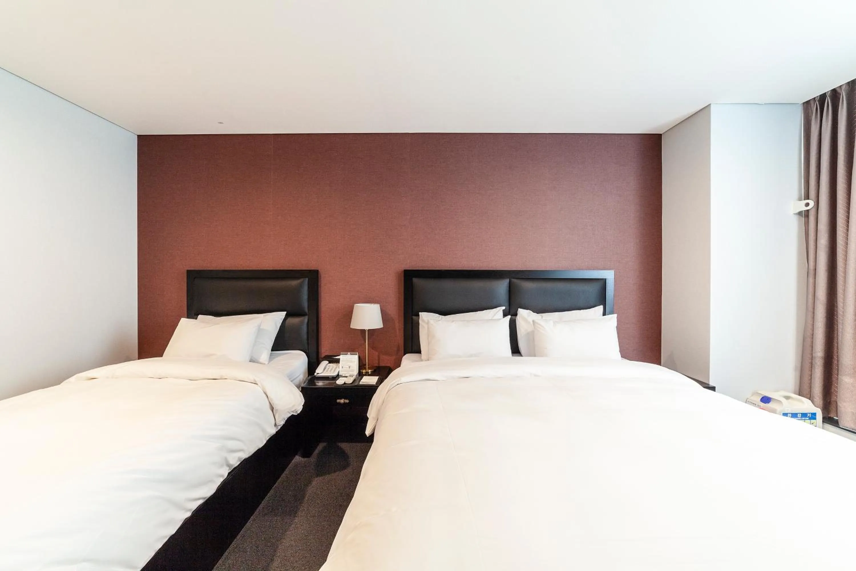 Bed in Gangneung Tourist Hotel