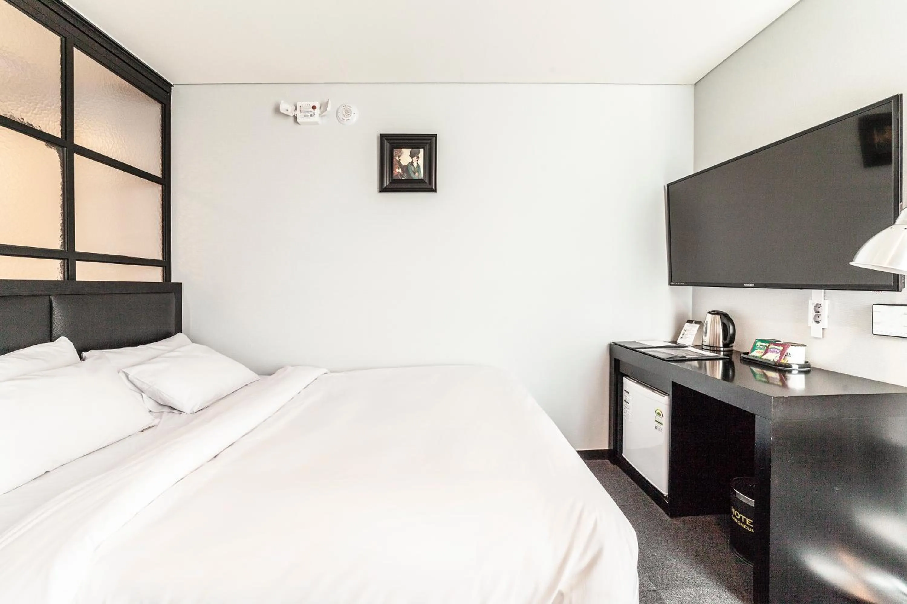 Bed in Gangneung Tourist Hotel