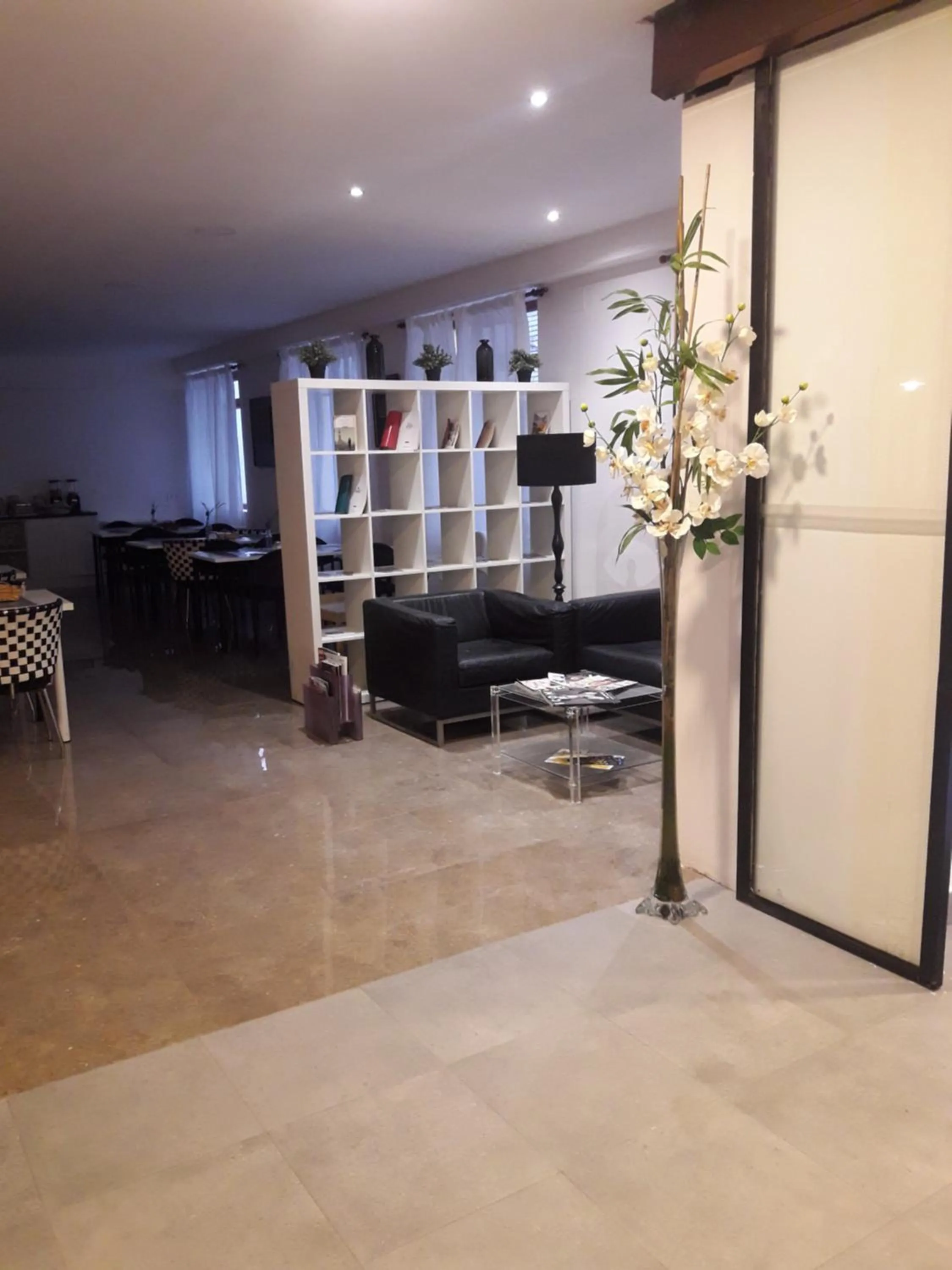 Communal lounge/ TV room in Nap Carta Puebla