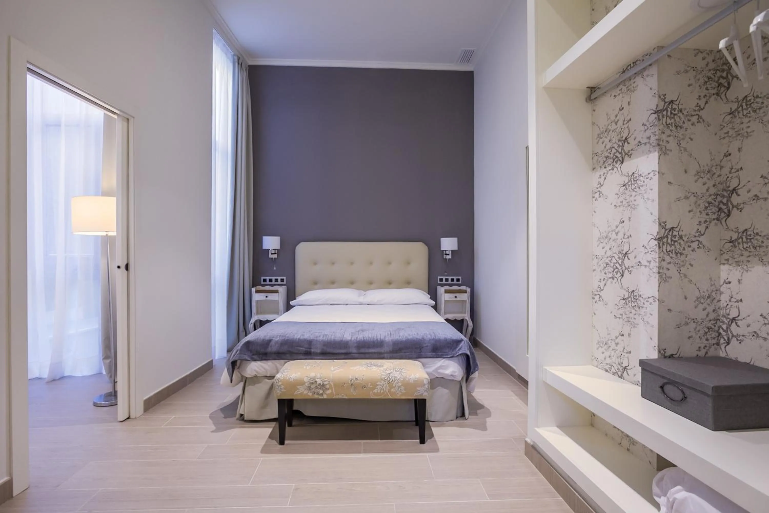 Bed in Welldone Cathedral Suites