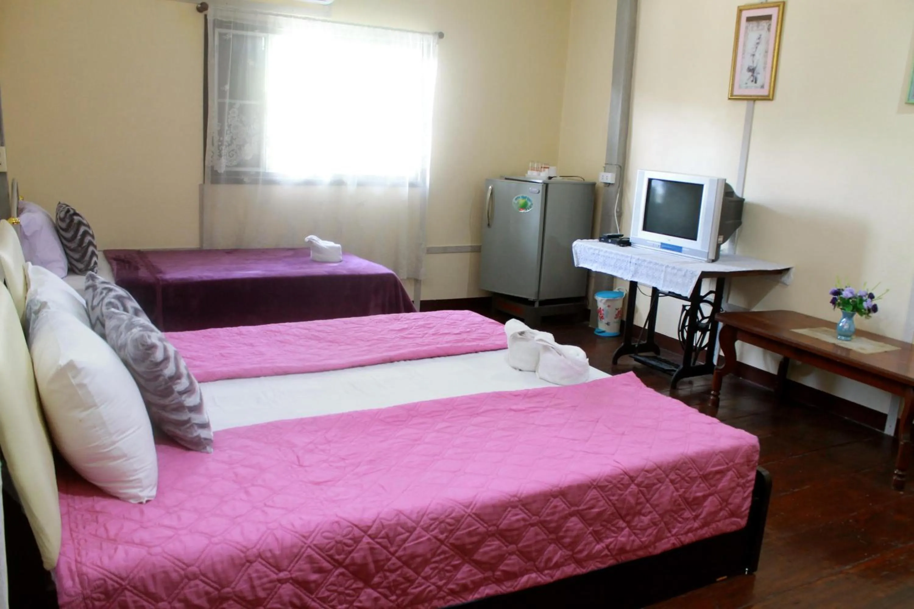 Photo of the whole room, Bed in Ban Khun Rin Homestay