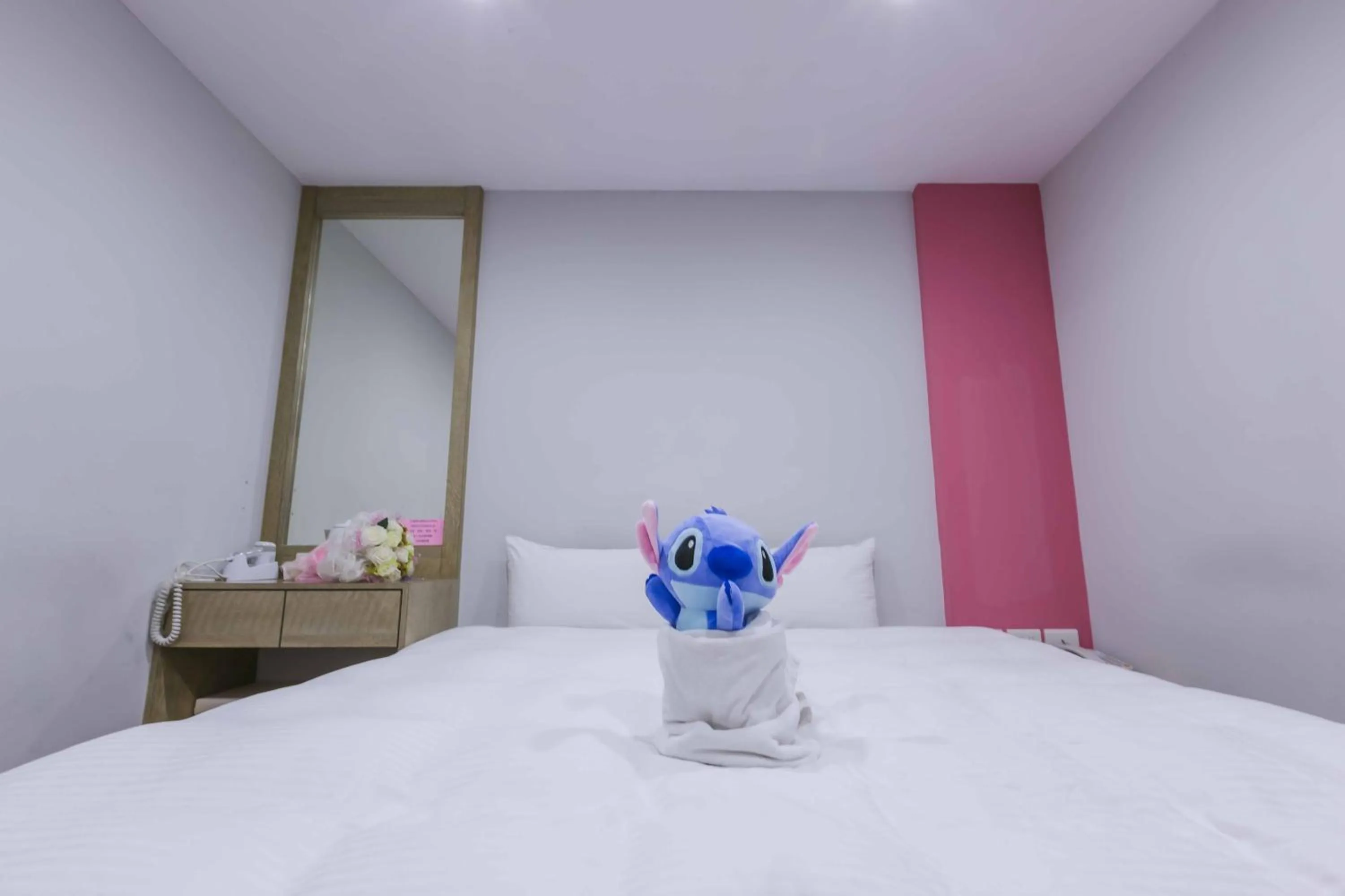 Bed in Mei Ti Fashion Hotel