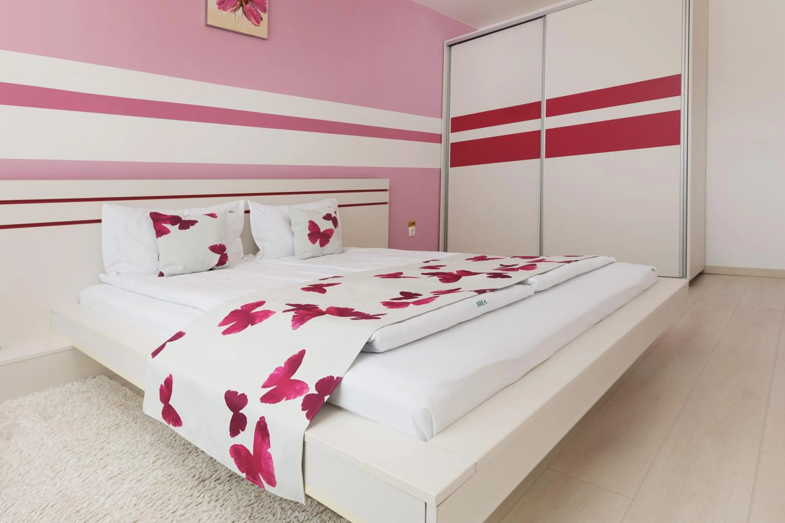 Bed in Brasov Holiday Apartments