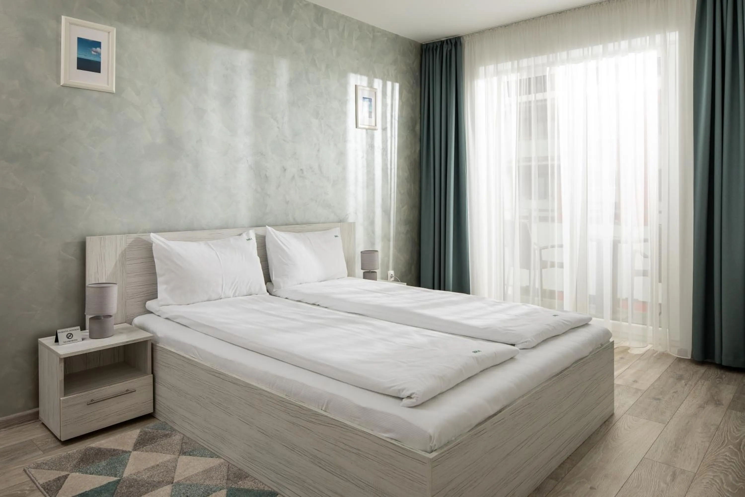 Bed in Brasov Holiday Apartments