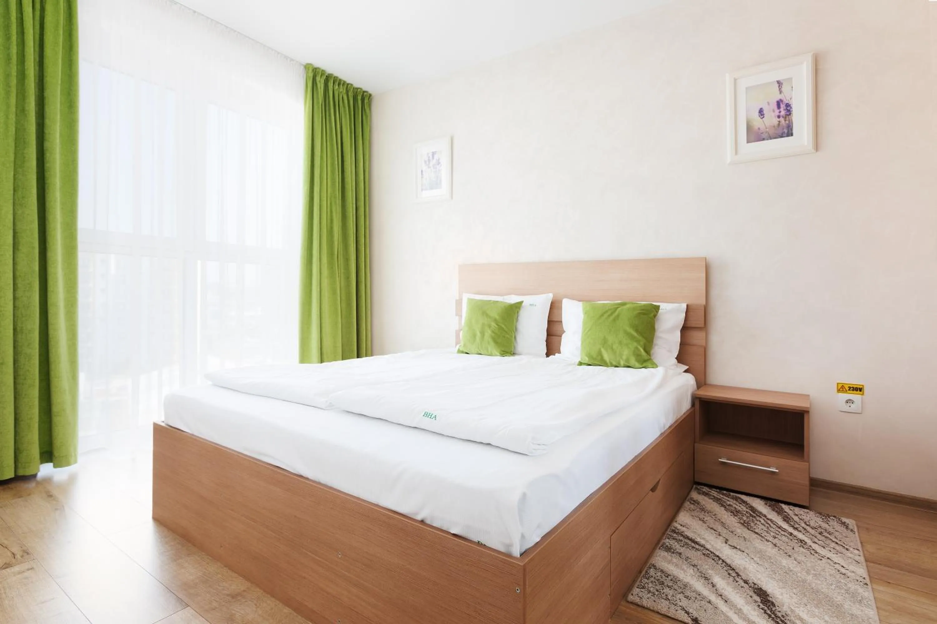 Bed in Brasov Holiday Apartments